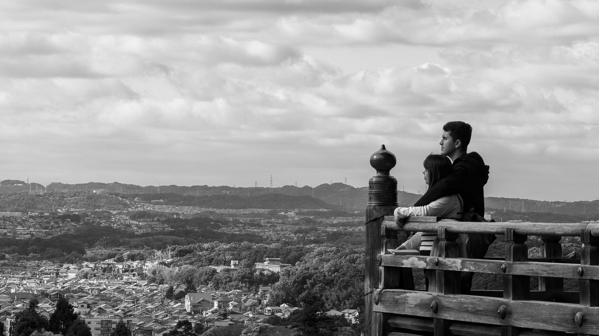 couple wearing silver-colored rings