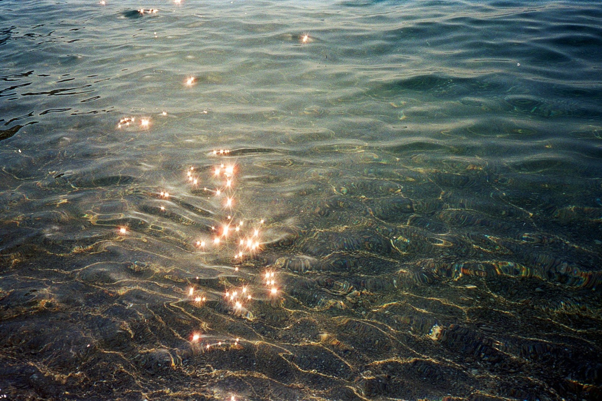 body of water under sky