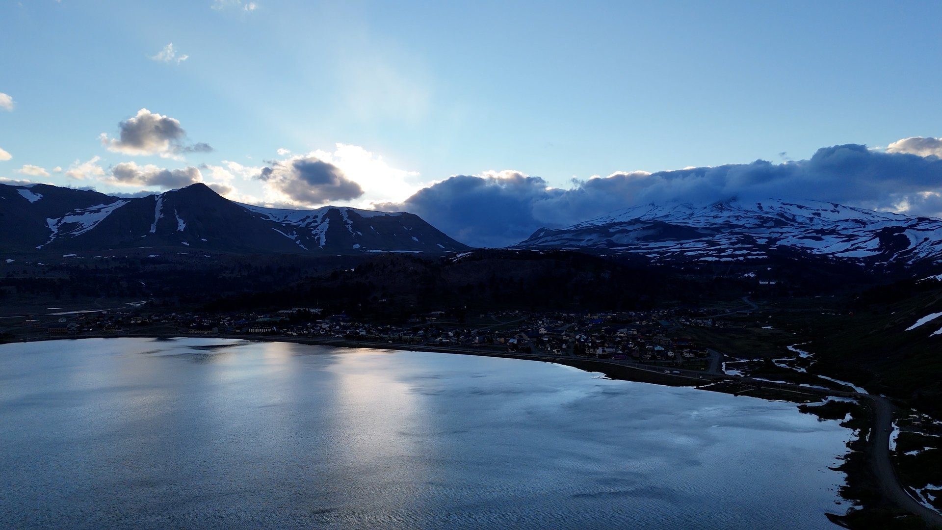 black and brown leather padded tub sofa