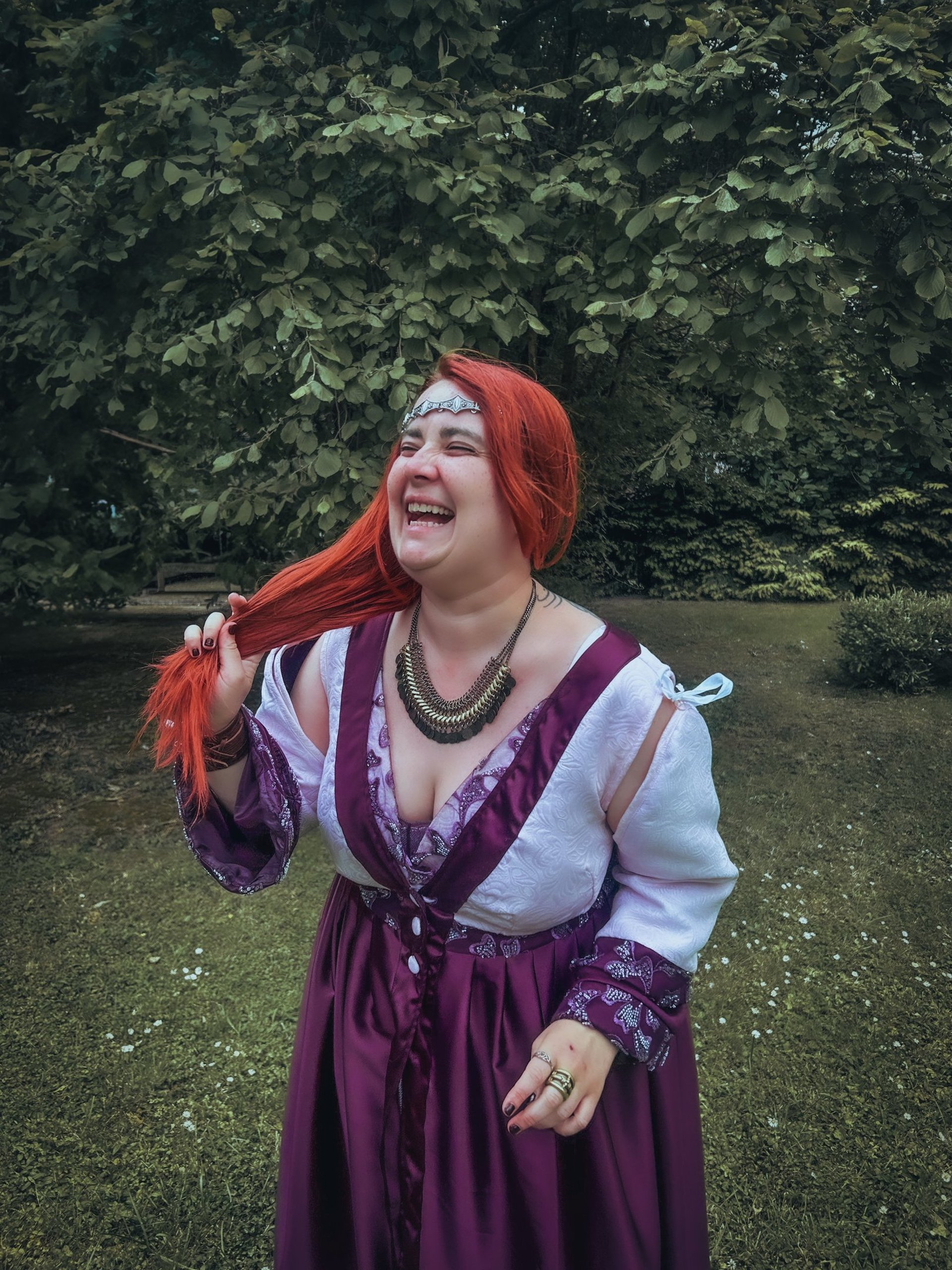 an abstract photo of a curved building with a blue sky in the background
