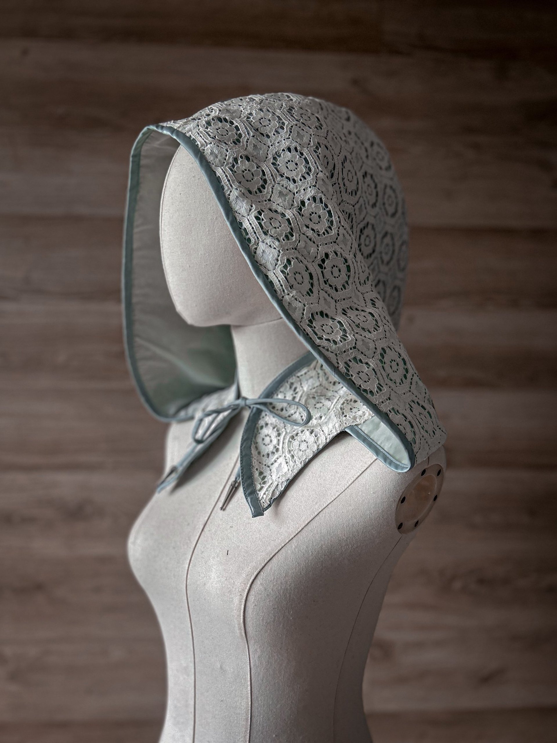 an abstract photo of a curved building with a blue sky in the background