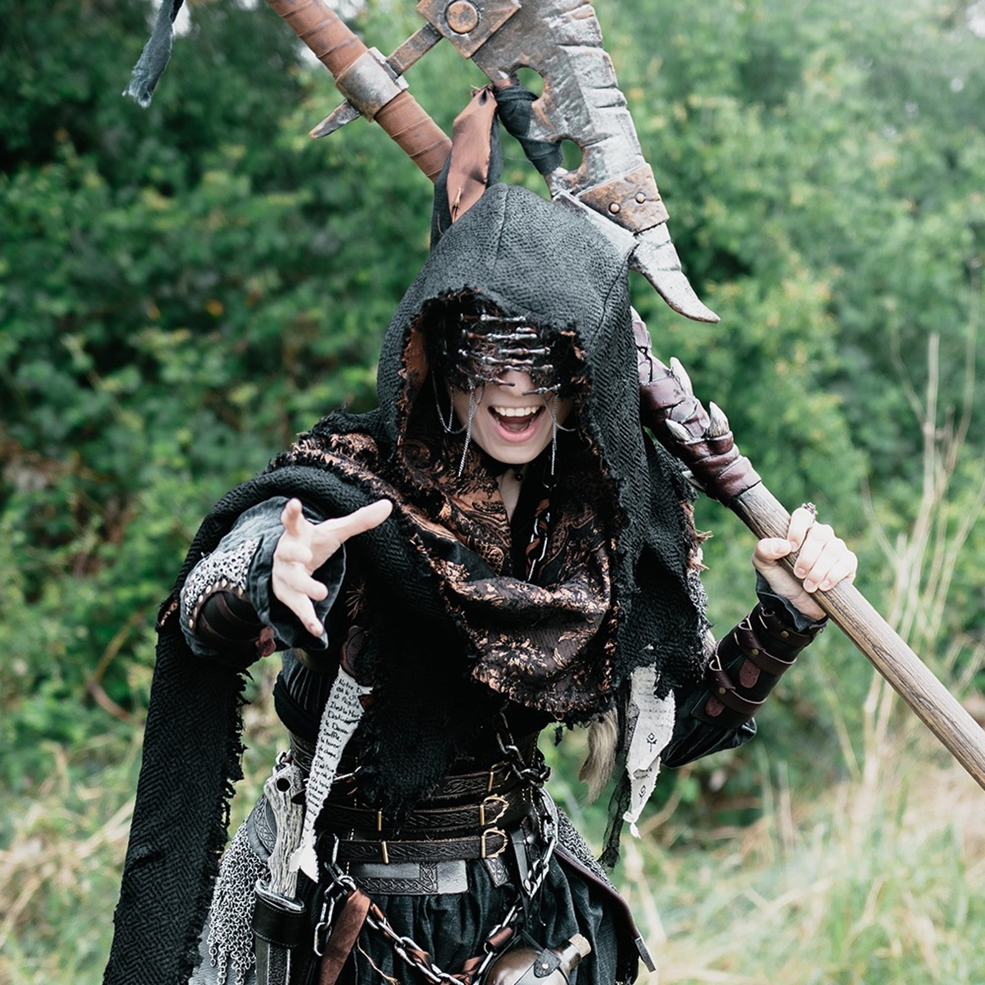 an abstract photo of a curved building with a blue sky in the background
