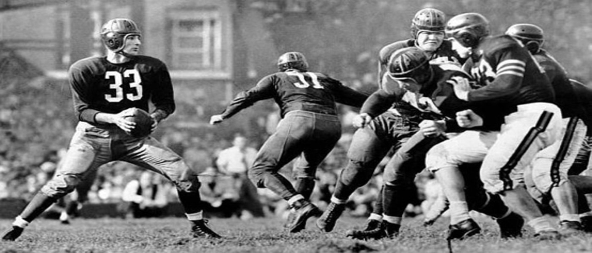 a group of football players standing next to each other