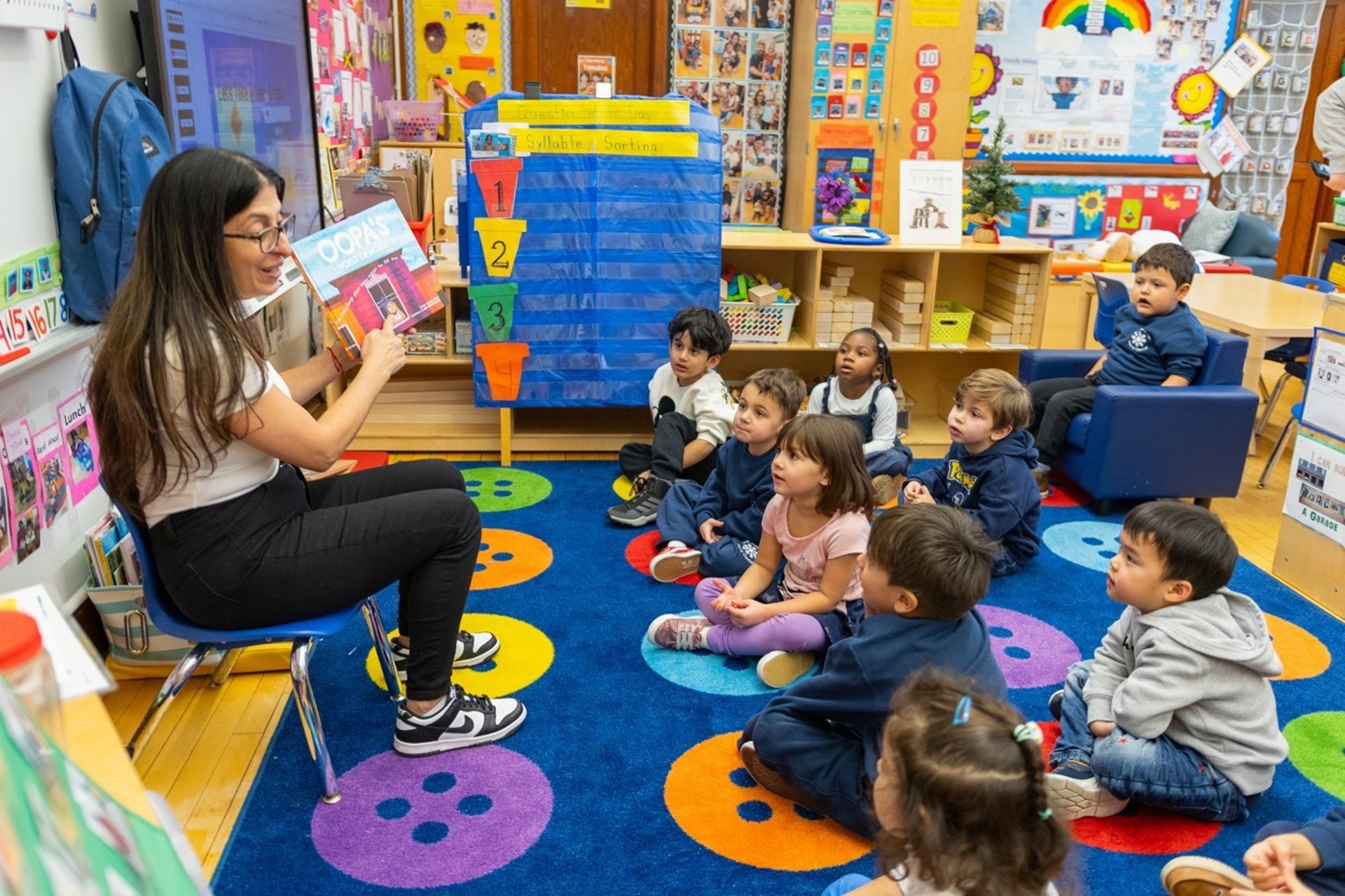 Teacher reads aloud OOPA's World.