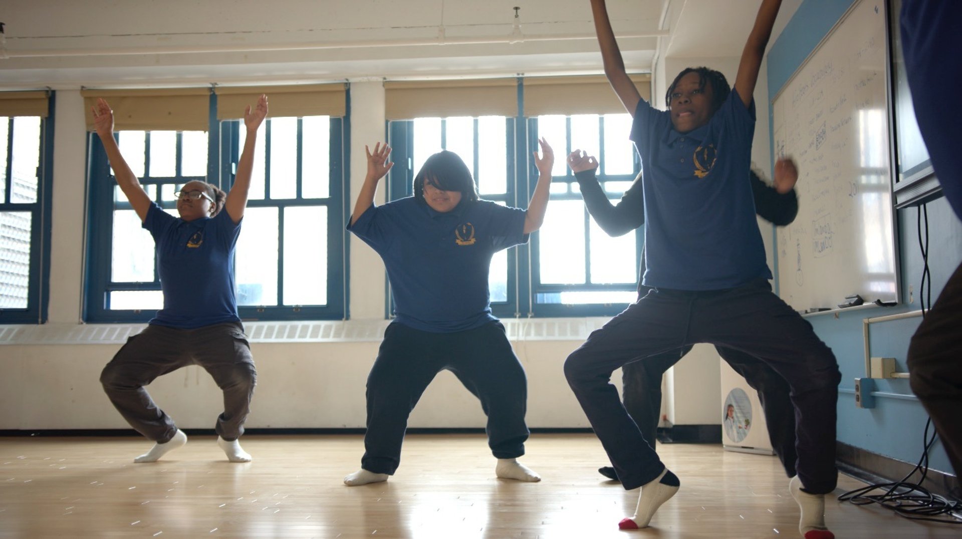 Students share a challenging workout .