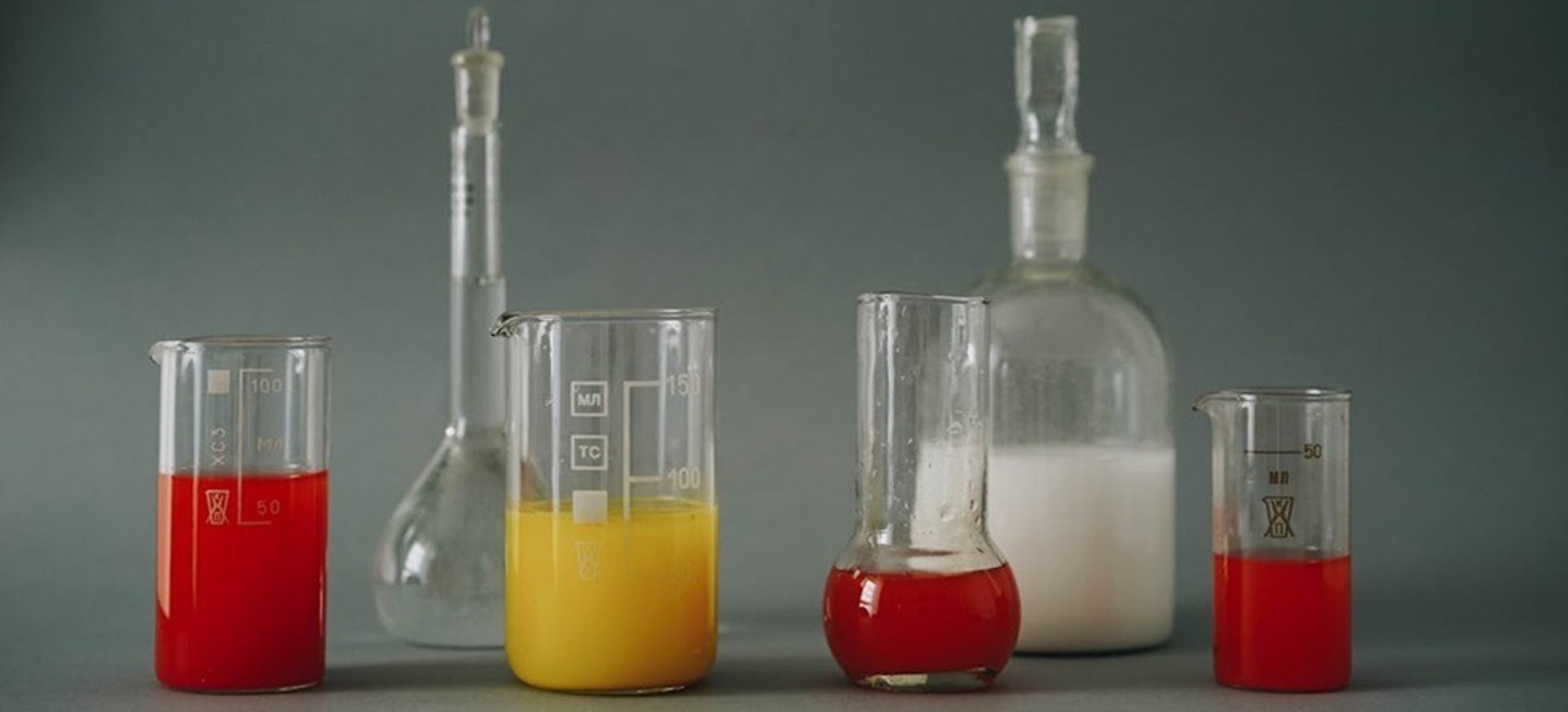 red and blue glass bottles