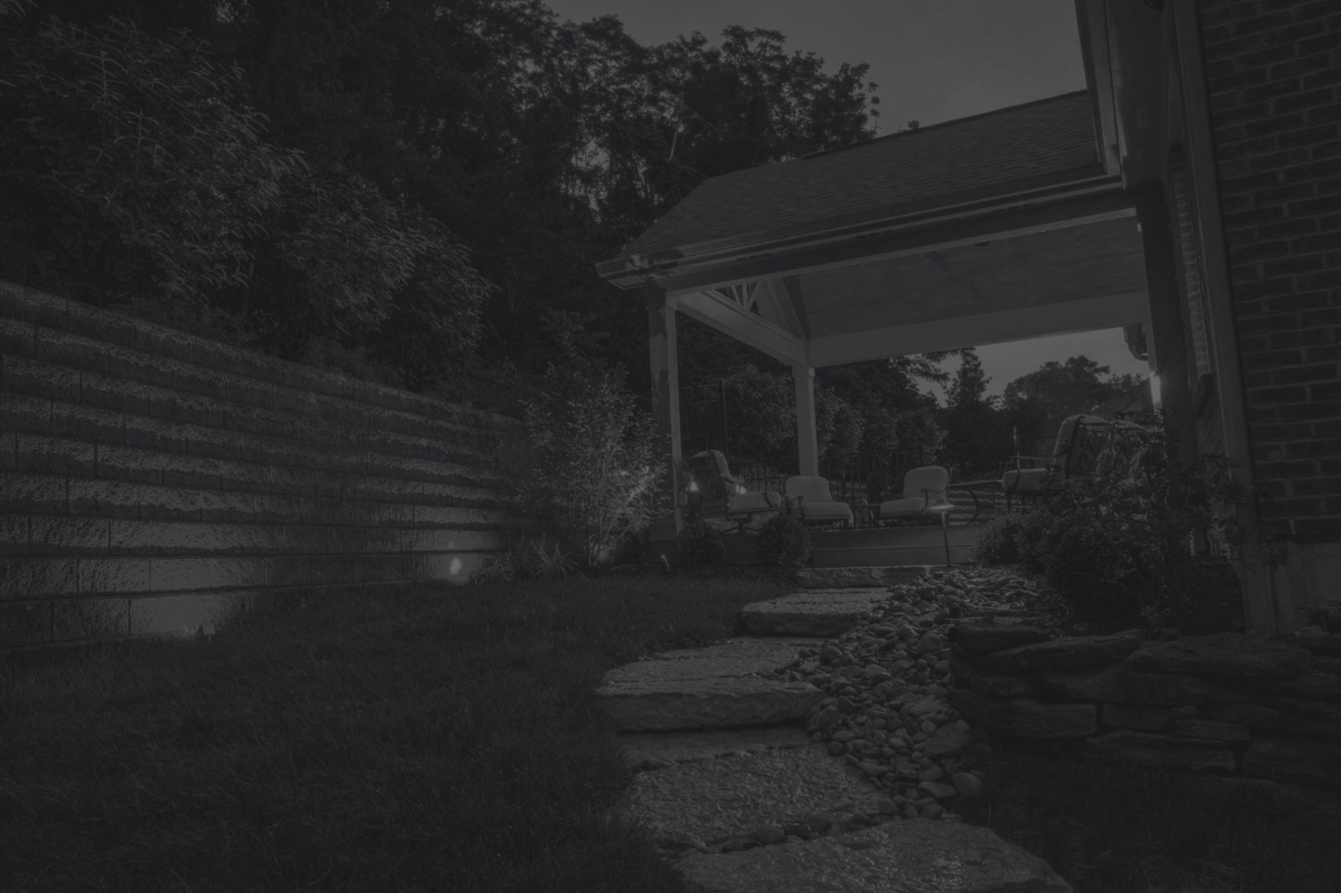 an abstract photo of a curved building with a blue sky in the background
