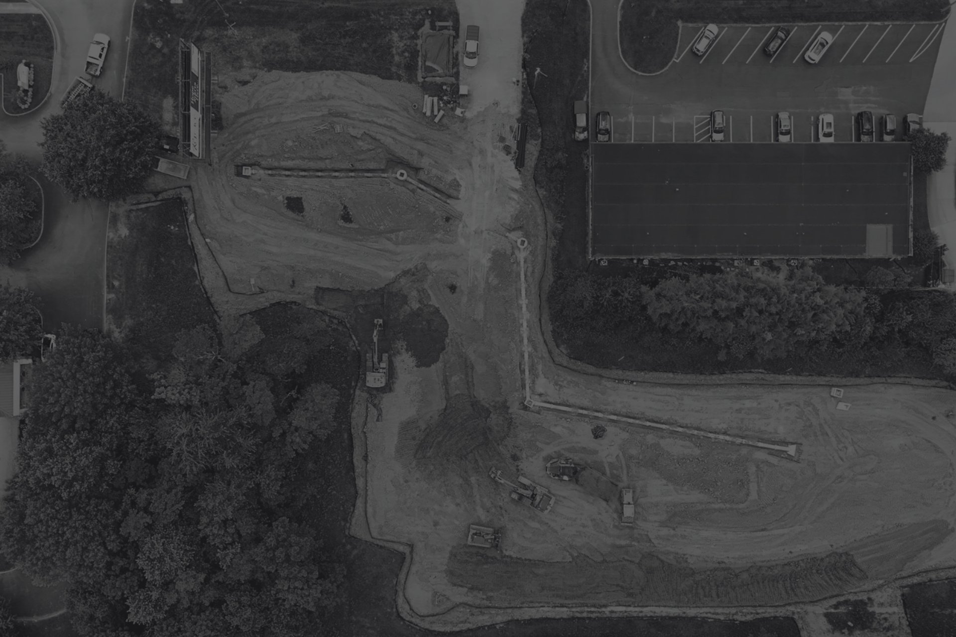 an abstract photo of a curved building with a blue sky in the background