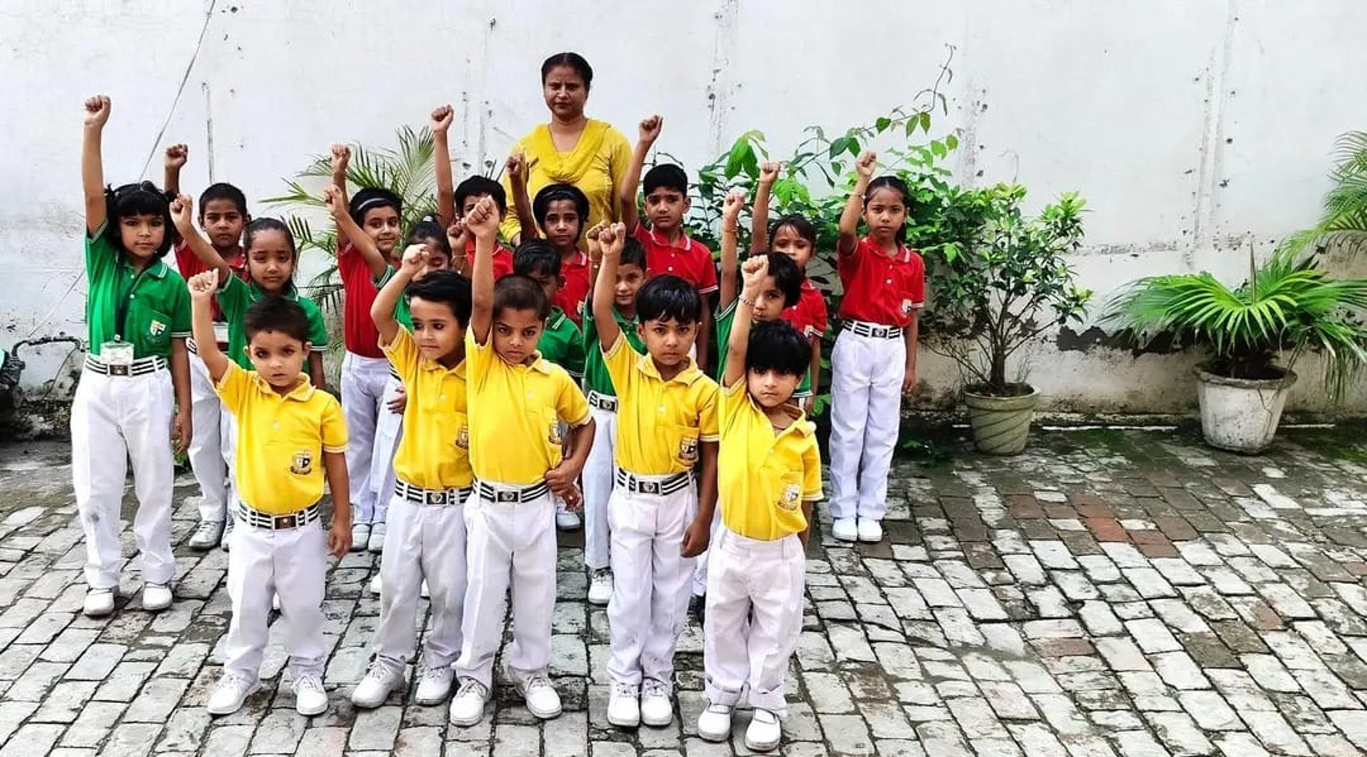woman wearing yellow long-sleeved dress under white clouds and blue sky during daytime