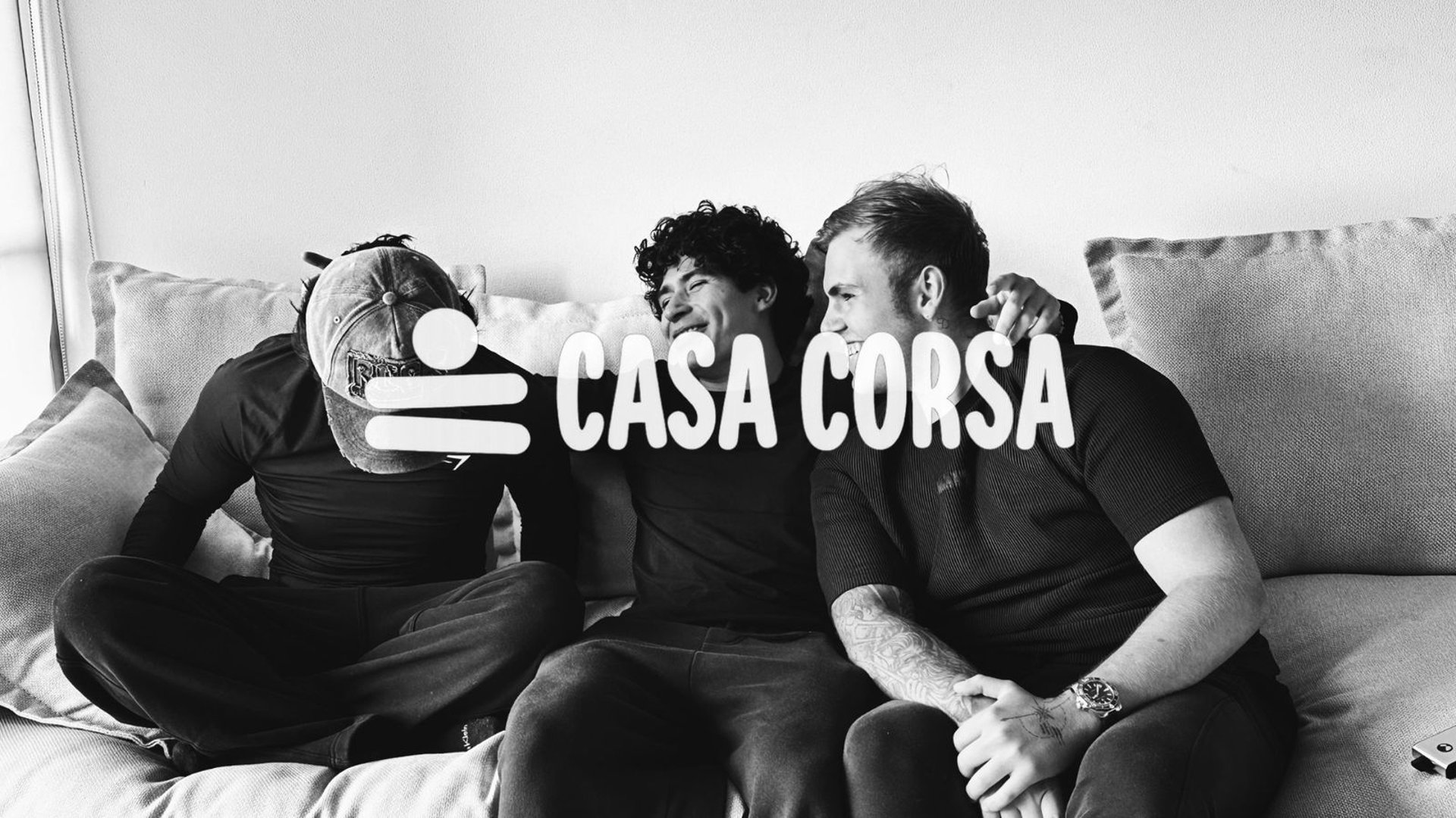 black and brown leather padded tub sofa