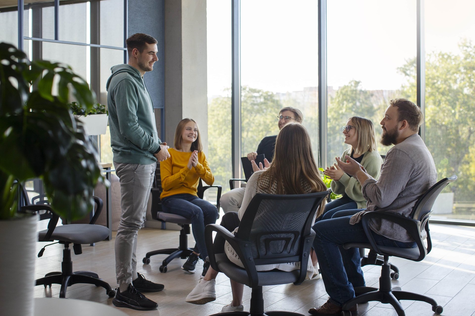 black and brown leather padded tub sofa