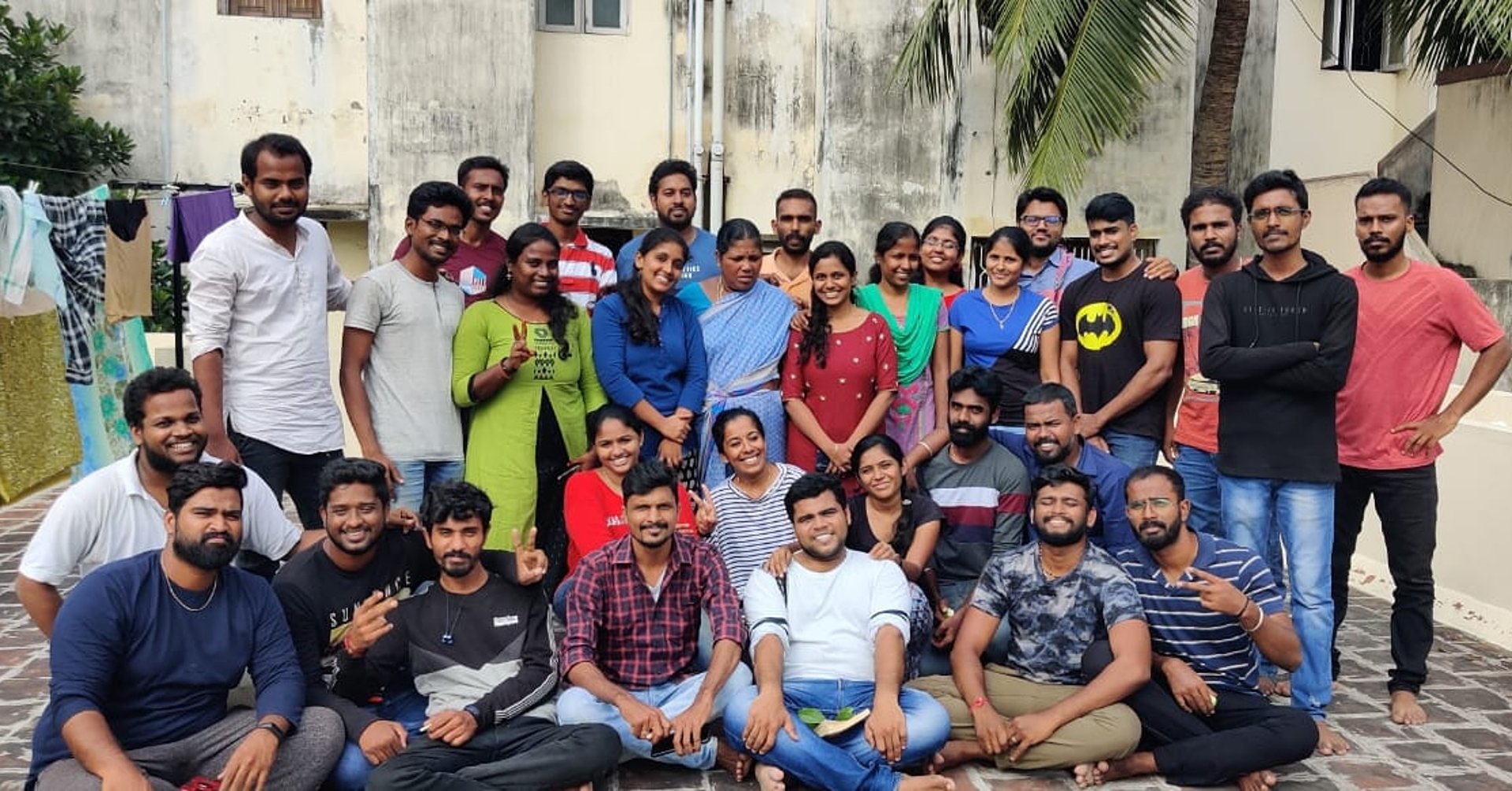 an abstract photo of a curved building with a blue sky in the background