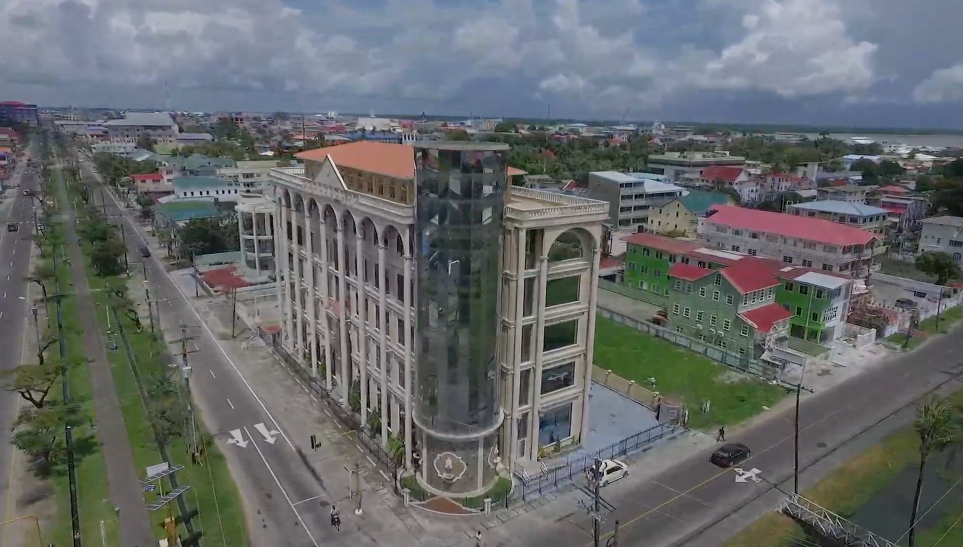black and brown leather padded tub sofa