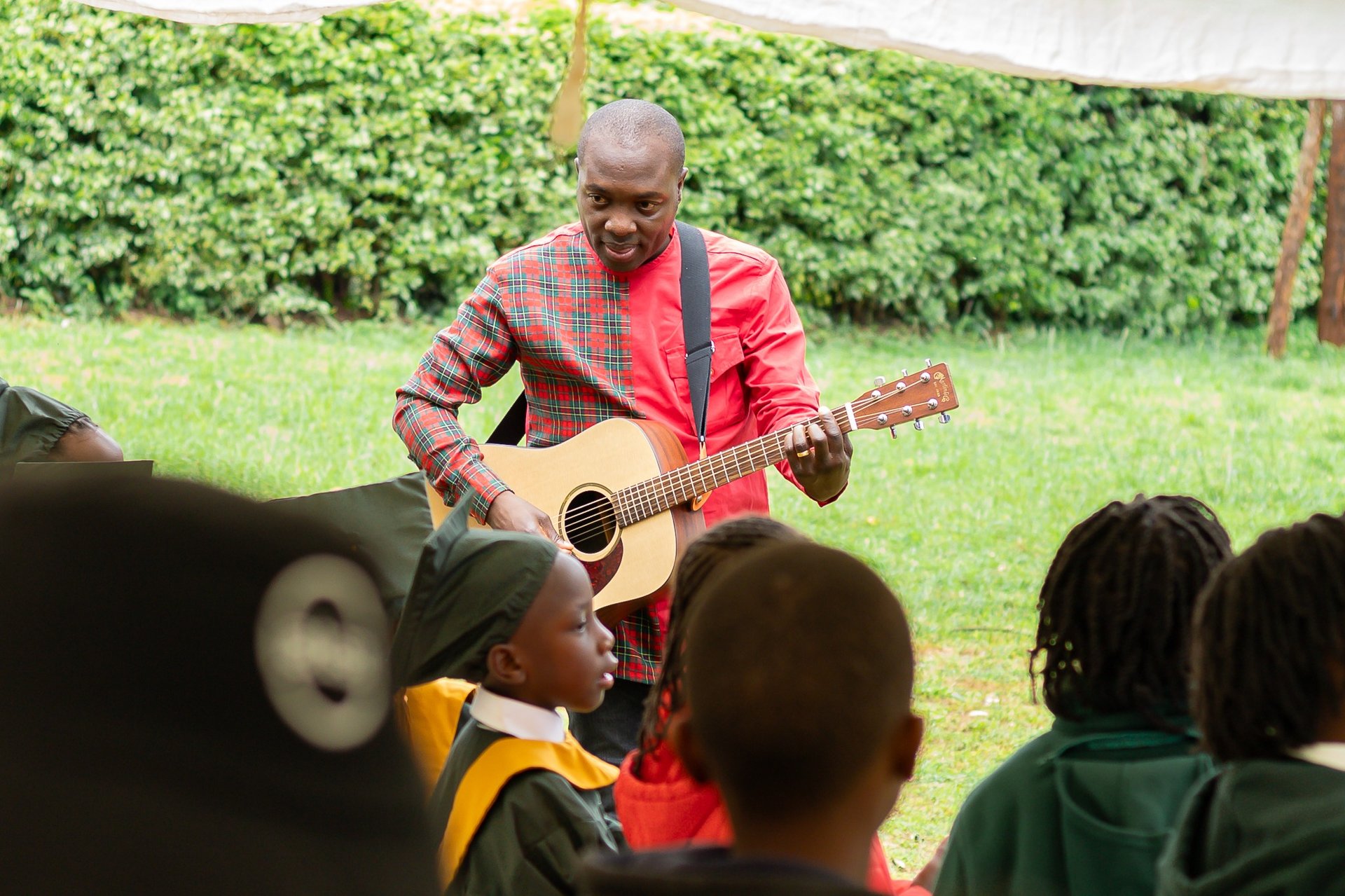 an abstract photo of a curved building with a blue sky in the background