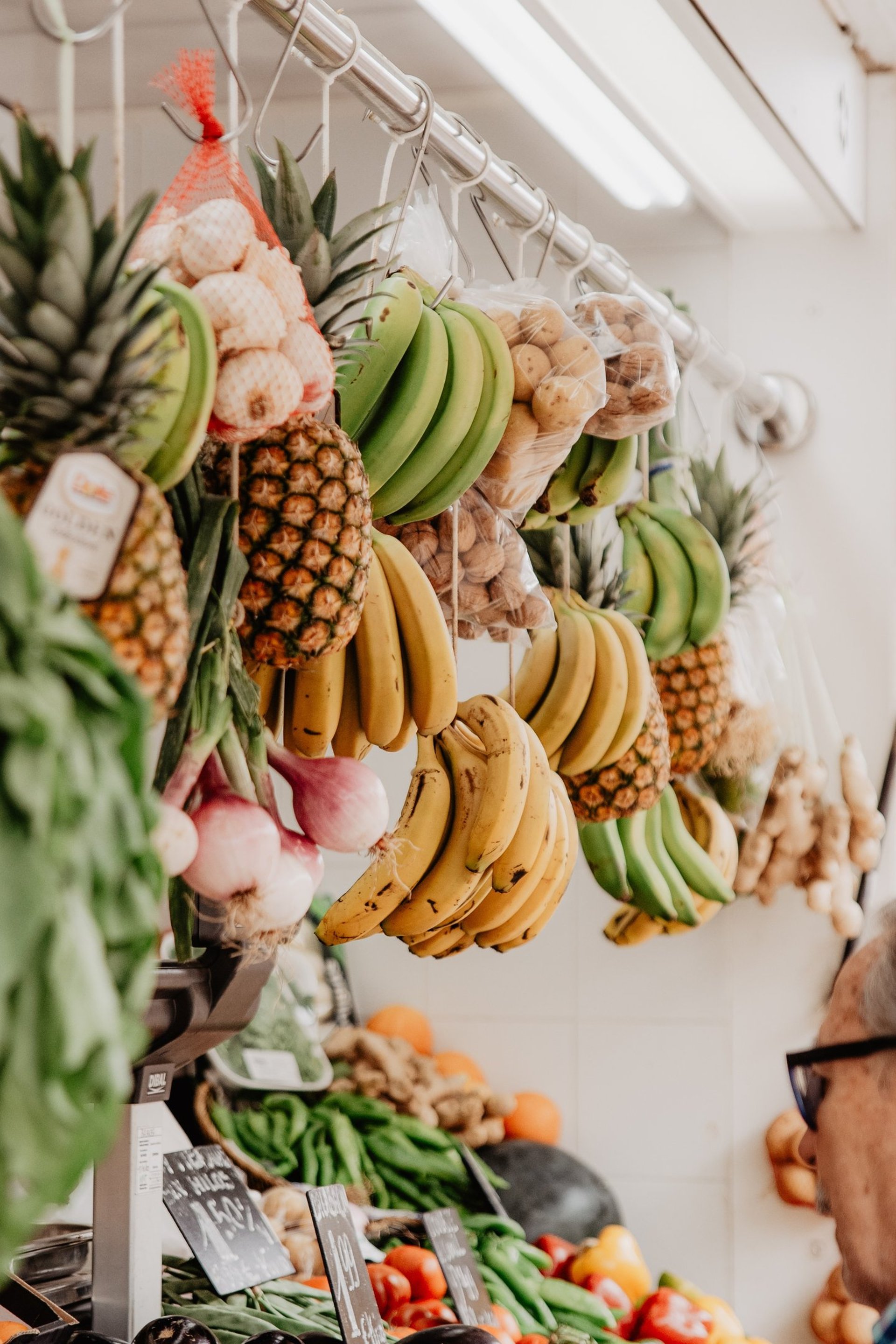 an abstract photo of a curved building with a blue sky in the background