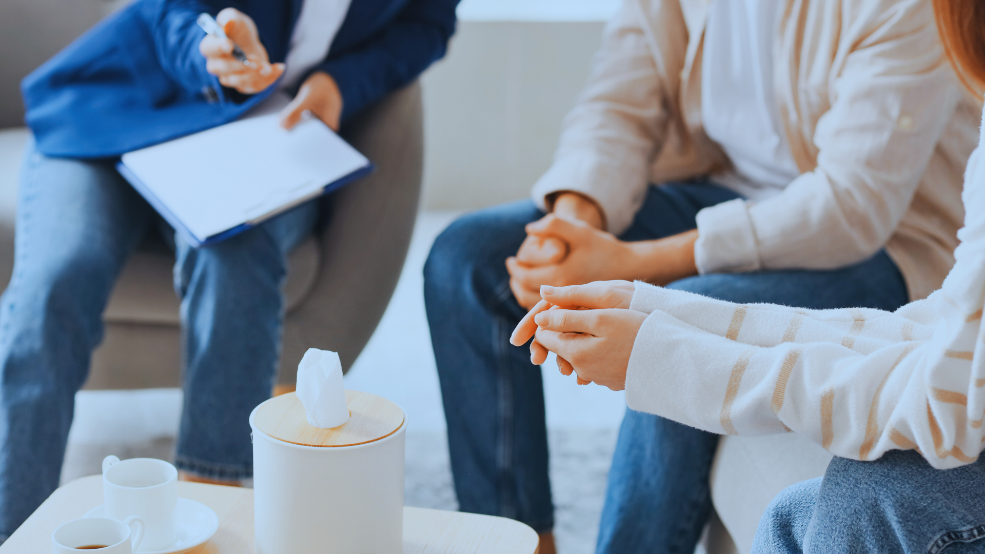 an abstract photo of a curved building with a blue sky in the background