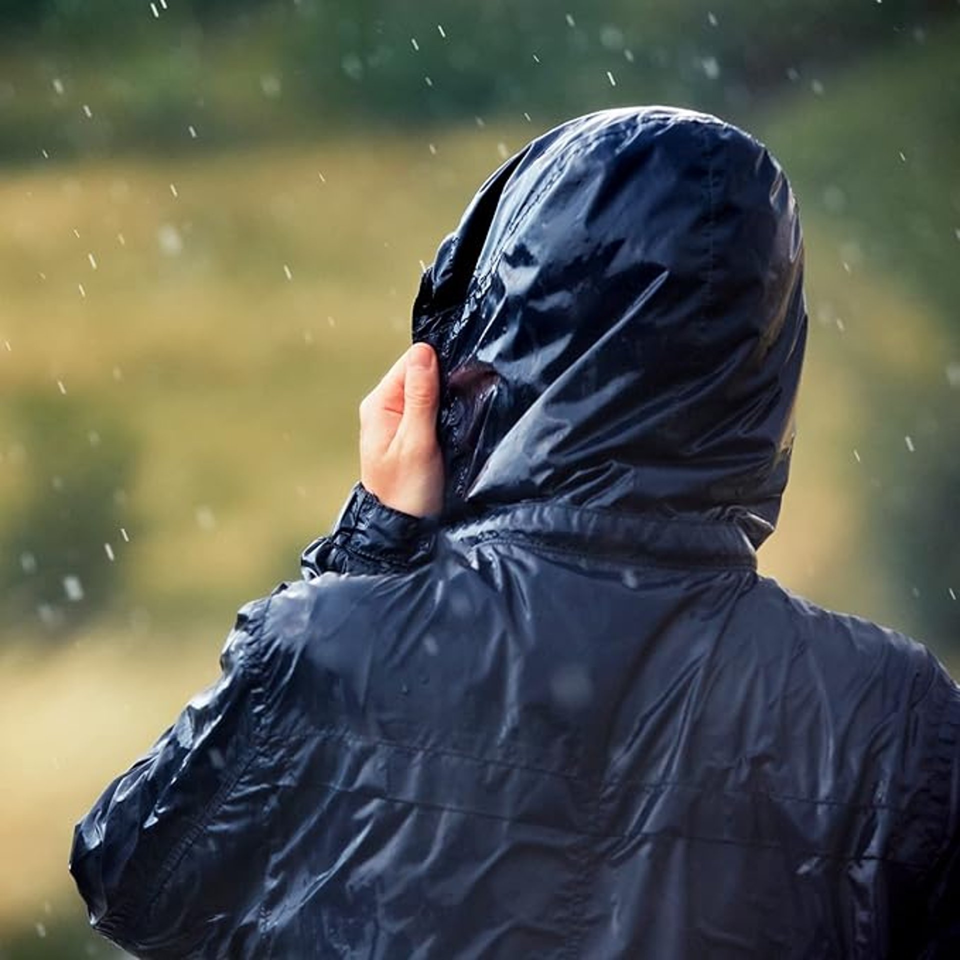 woman wearing yellow long-sleeved dress under white clouds and blue sky during daytime