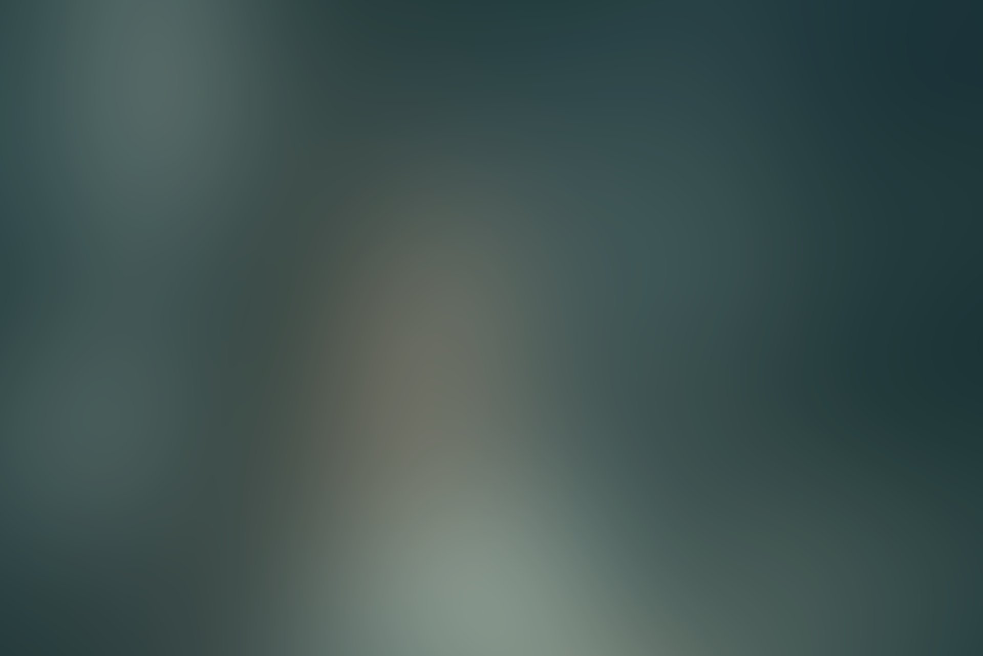 a close up of a black and brown abstract painting