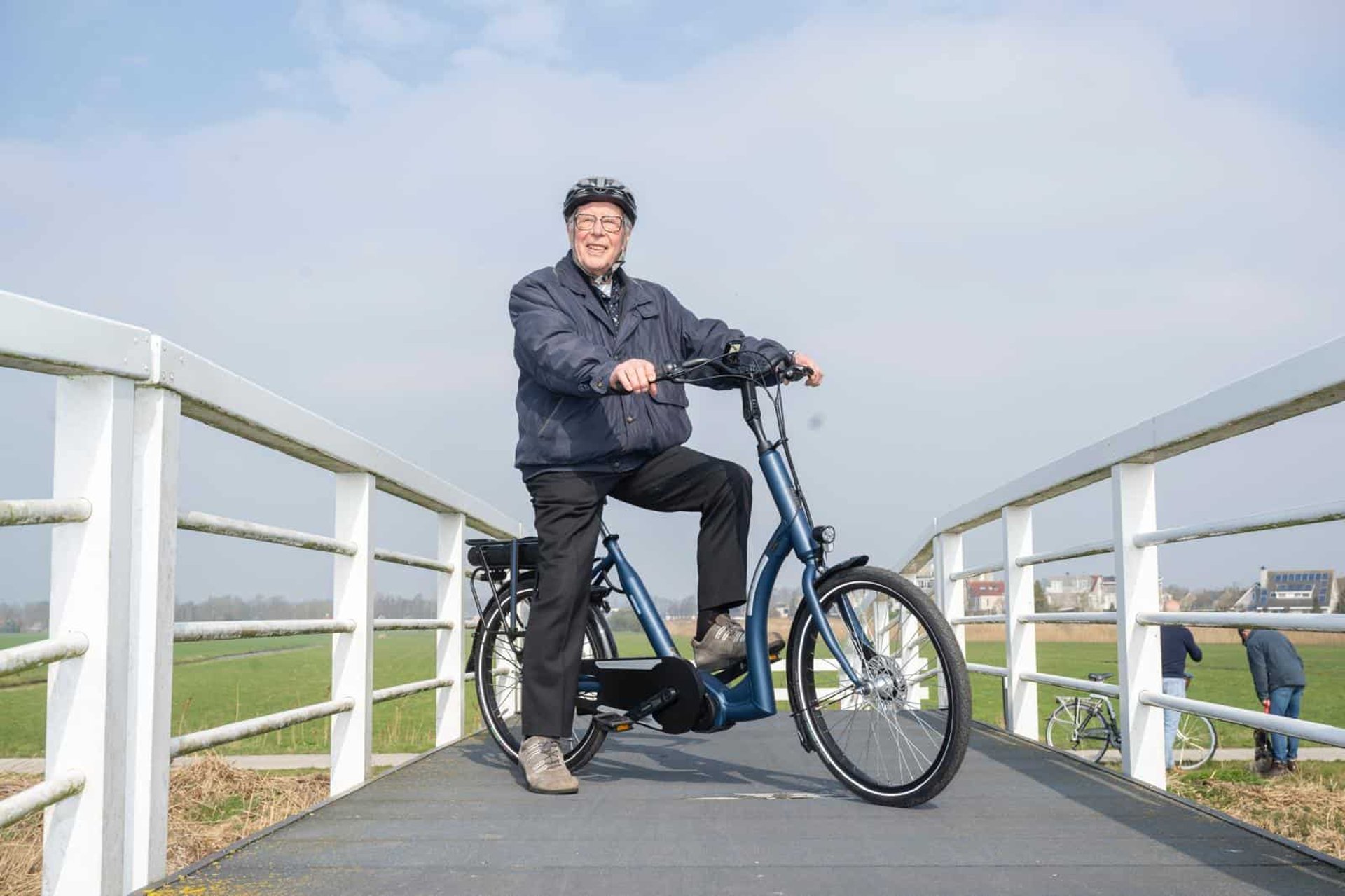 an abstract photo of a curved building with a blue sky in the background
