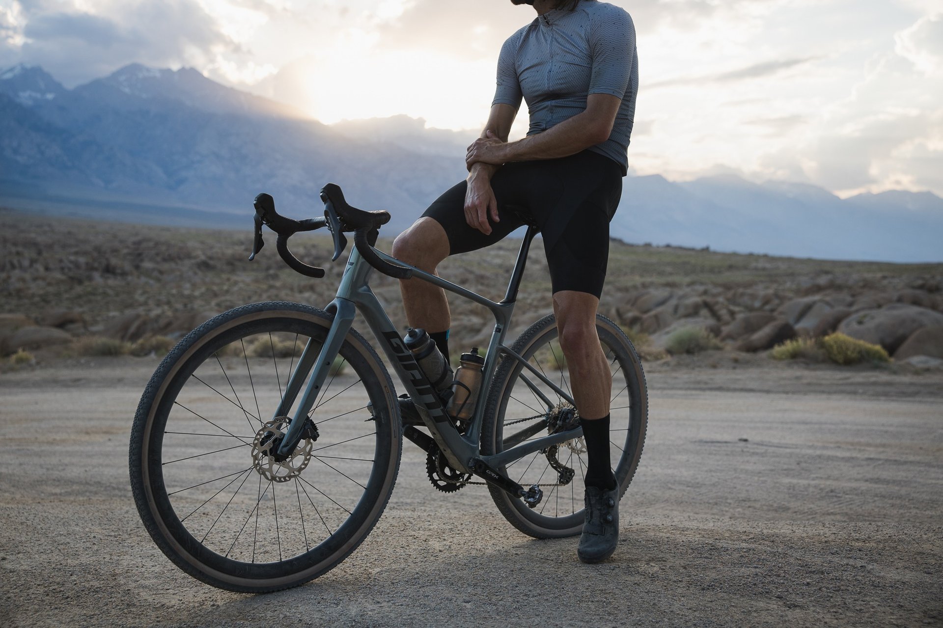 an abstract photo of a curved building with a blue sky in the background