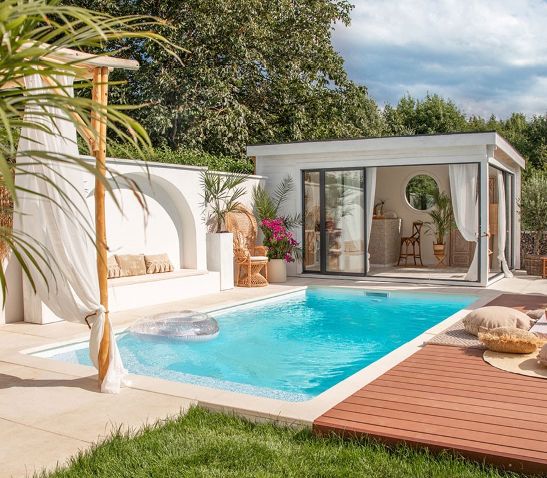 an abstract photo of a curved building with a blue sky in the background