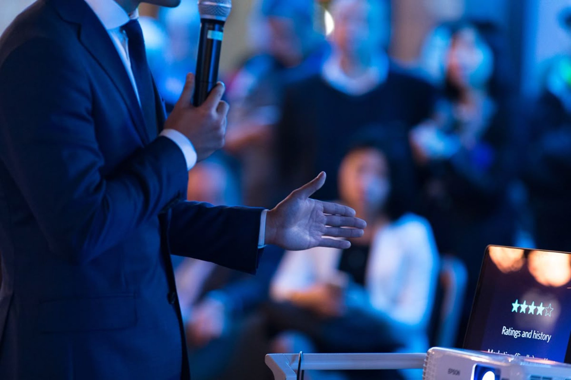 an abstract photo of a curved building with a blue sky in the background