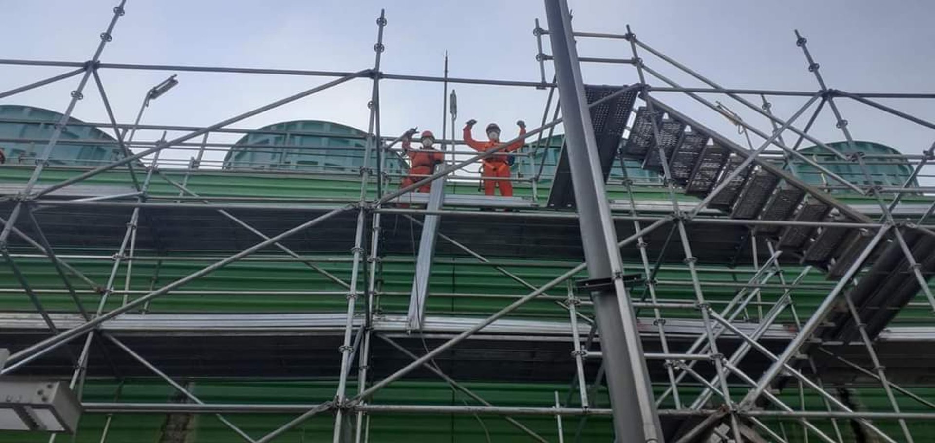 black and brown leather padded tub sofa