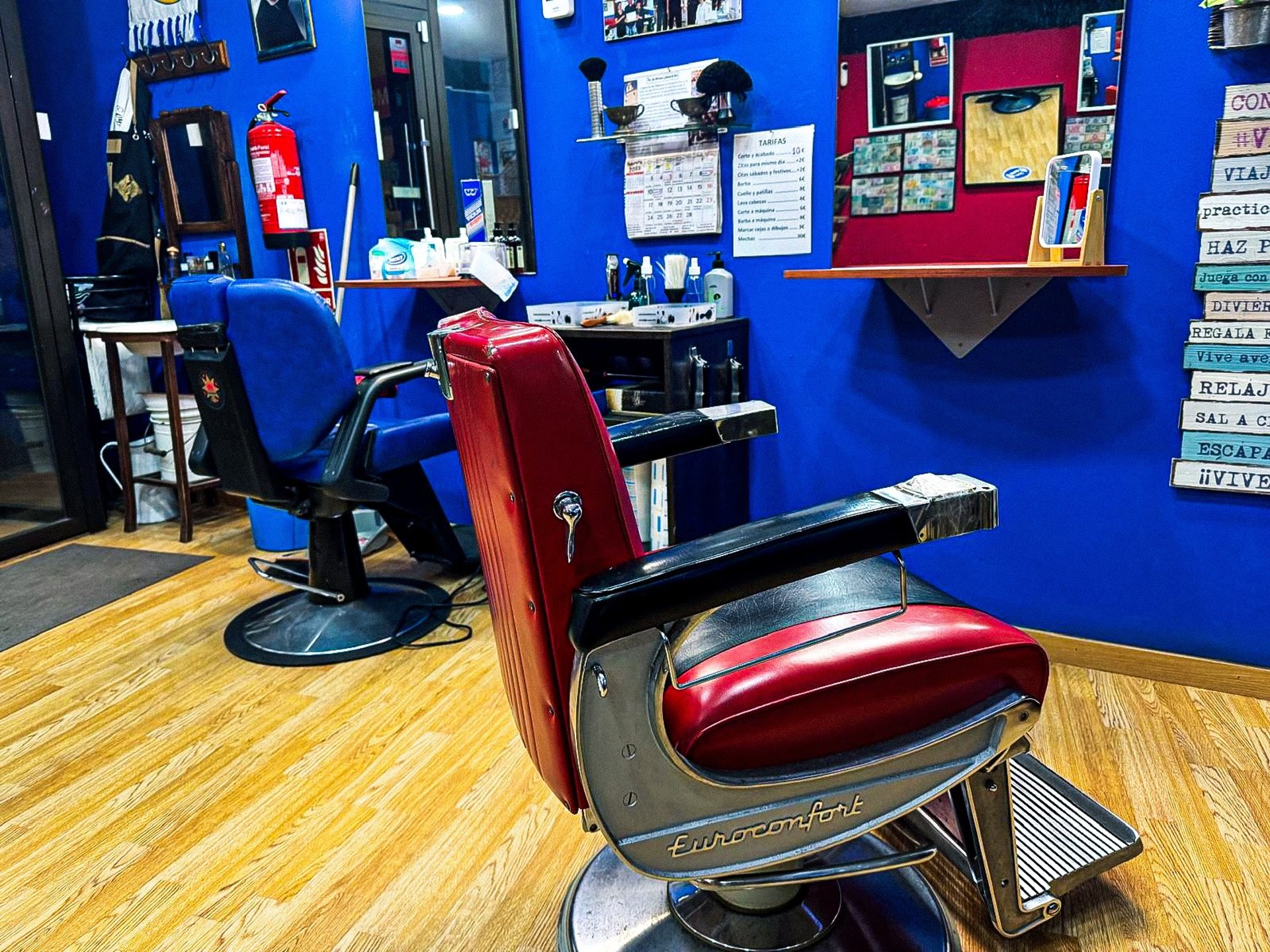 a person holding a pair of scissors in their hand