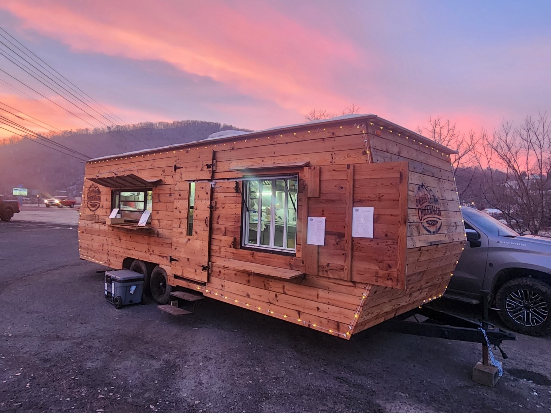 black and brown leather padded tub sofa
