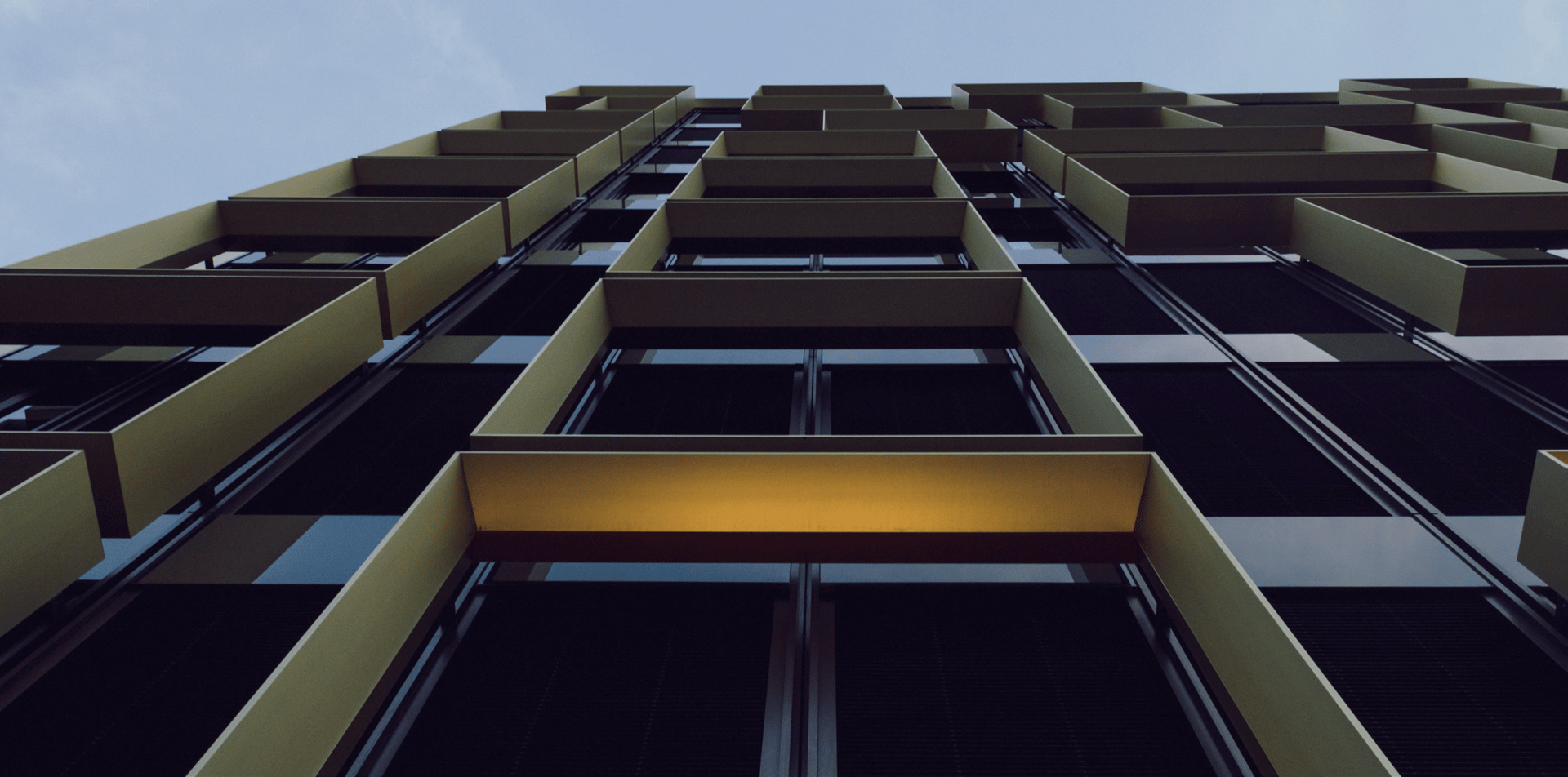 black and brown leather padded tub sofa