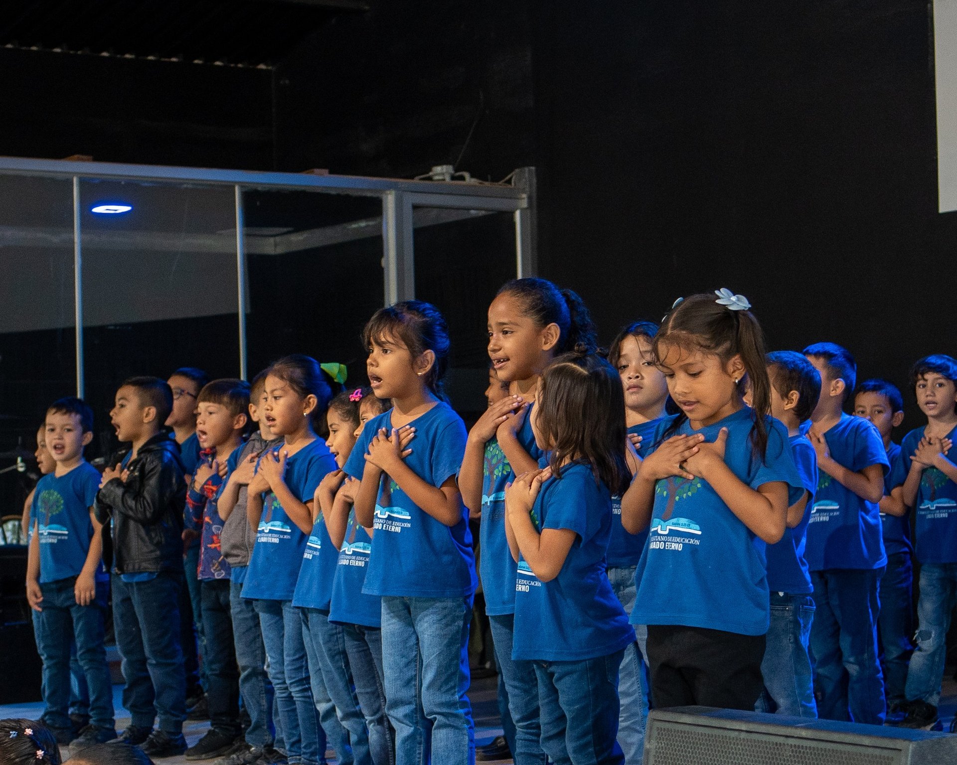 woman wearing yellow long-sleeved dress under white clouds and blue sky during daytime