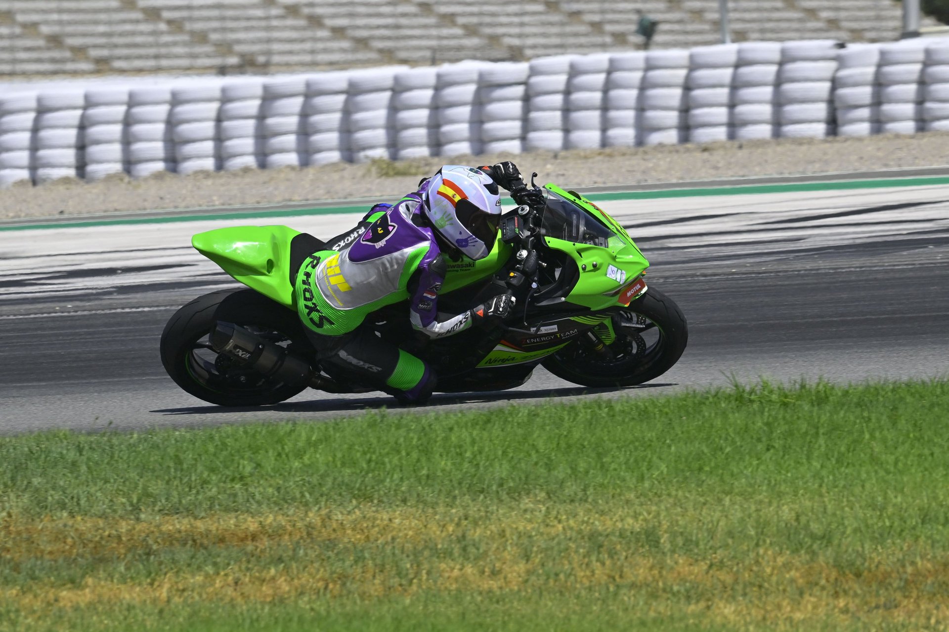 an abstract photo of a curved building with a blue sky in the background