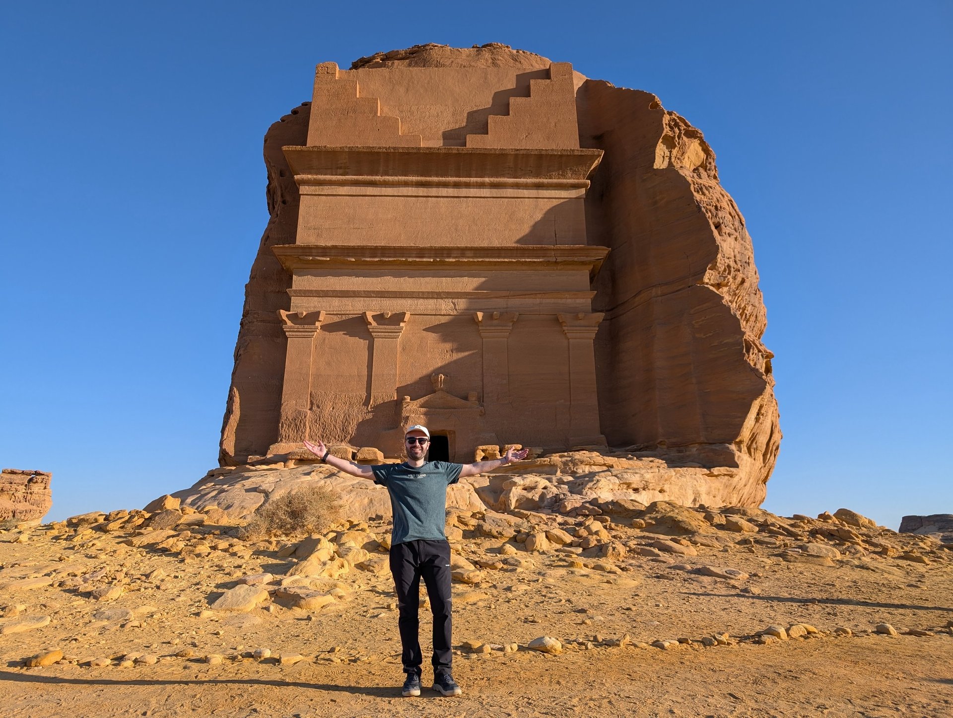 brown rock formation under white sky during daytime