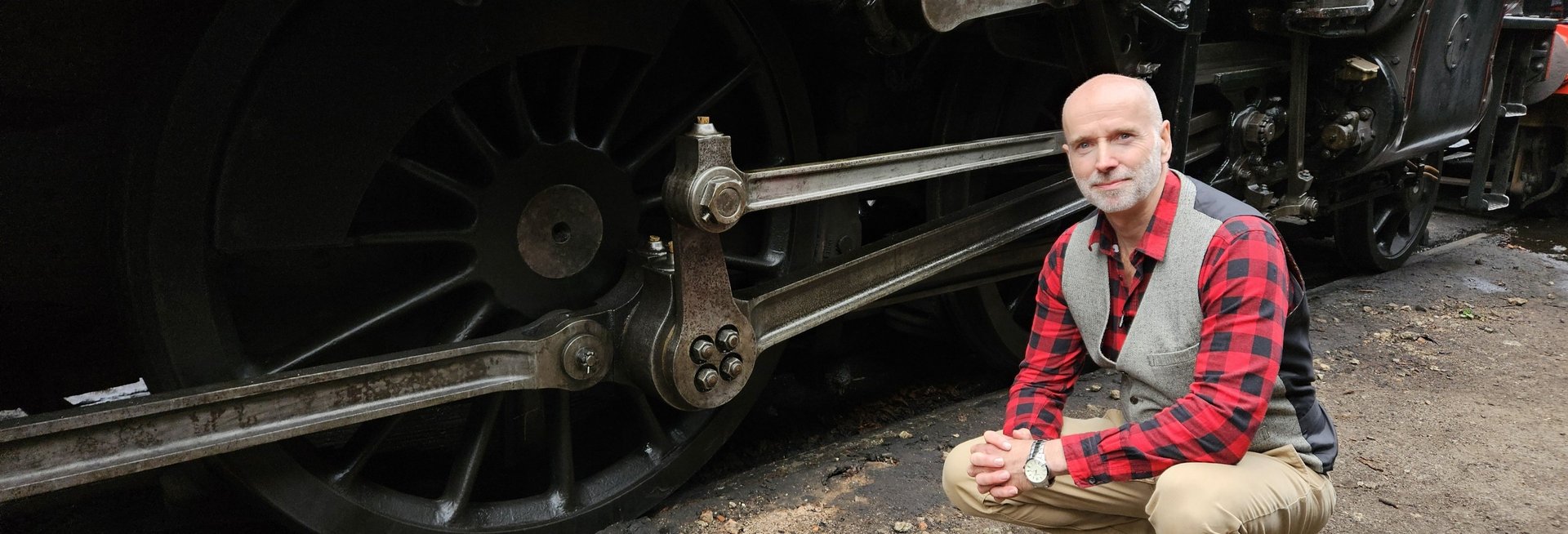 an abstract photo of a curved building with a blue sky in the background