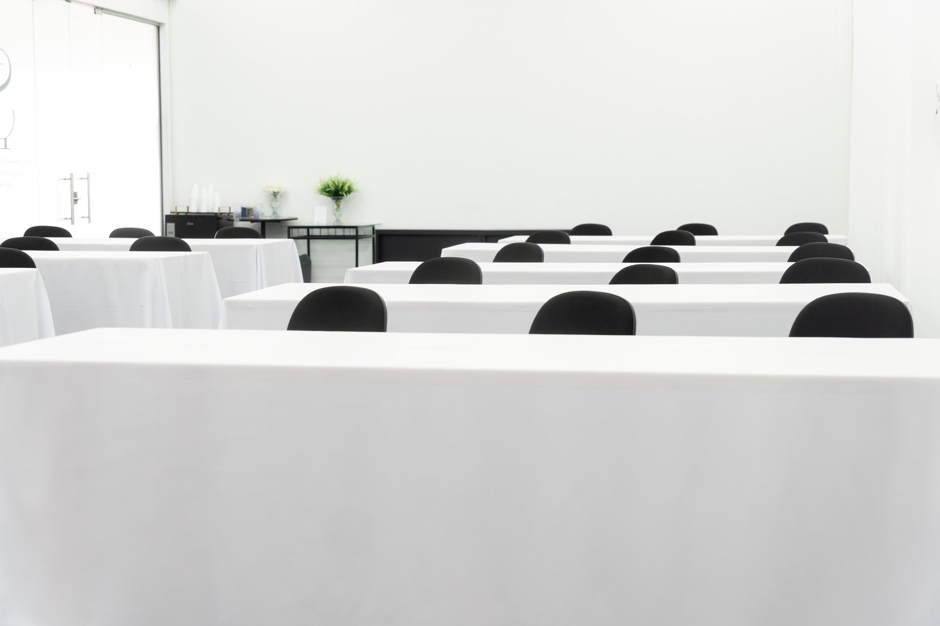 a dining room with a table and chairs