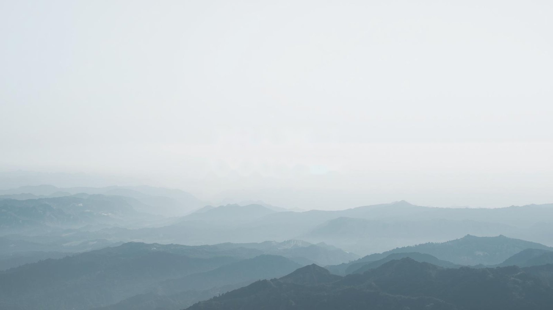 woman wearing yellow long-sleeved dress under white clouds and blue sky during daytime