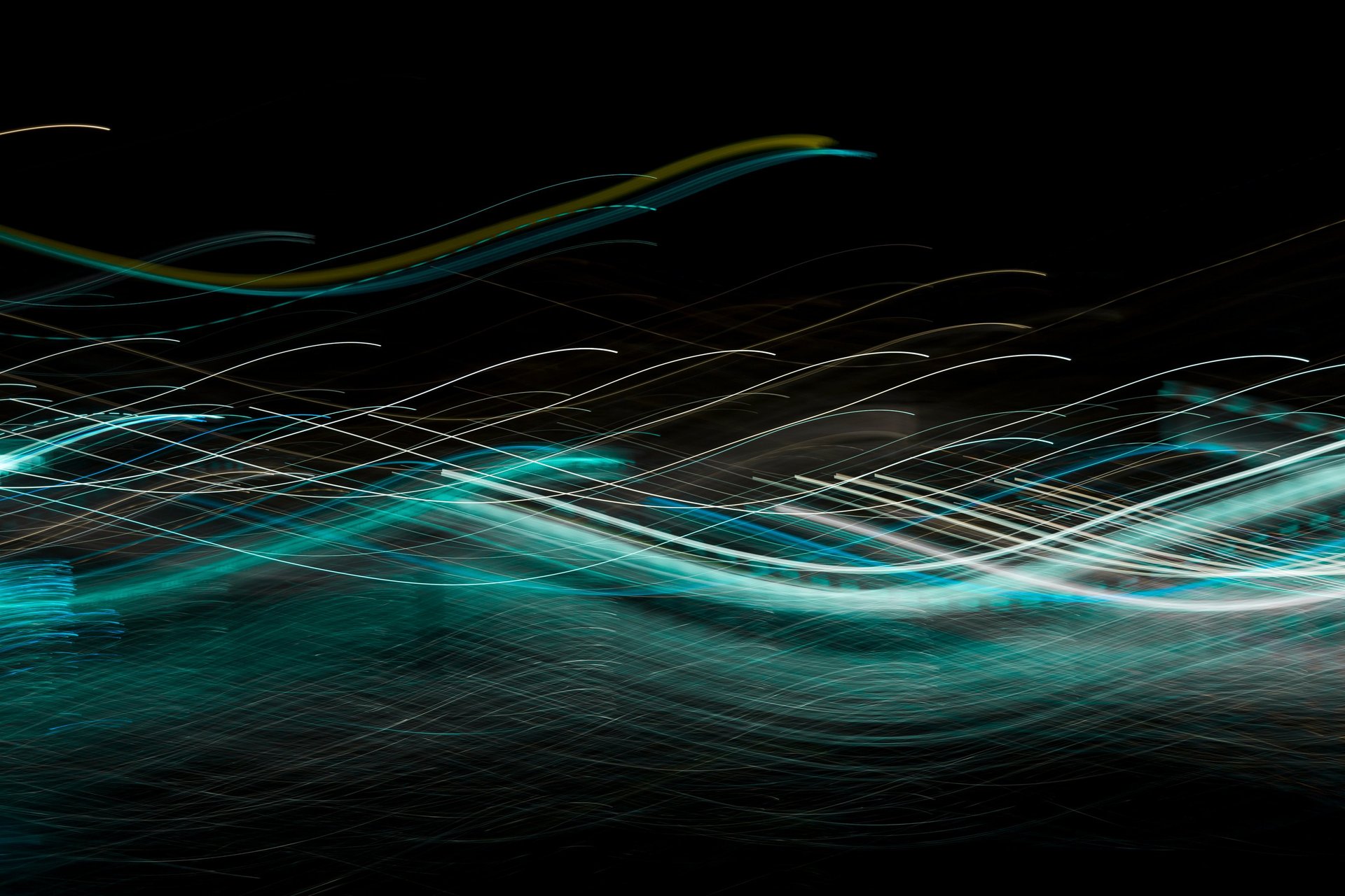 an escalator in a dark building with stairs