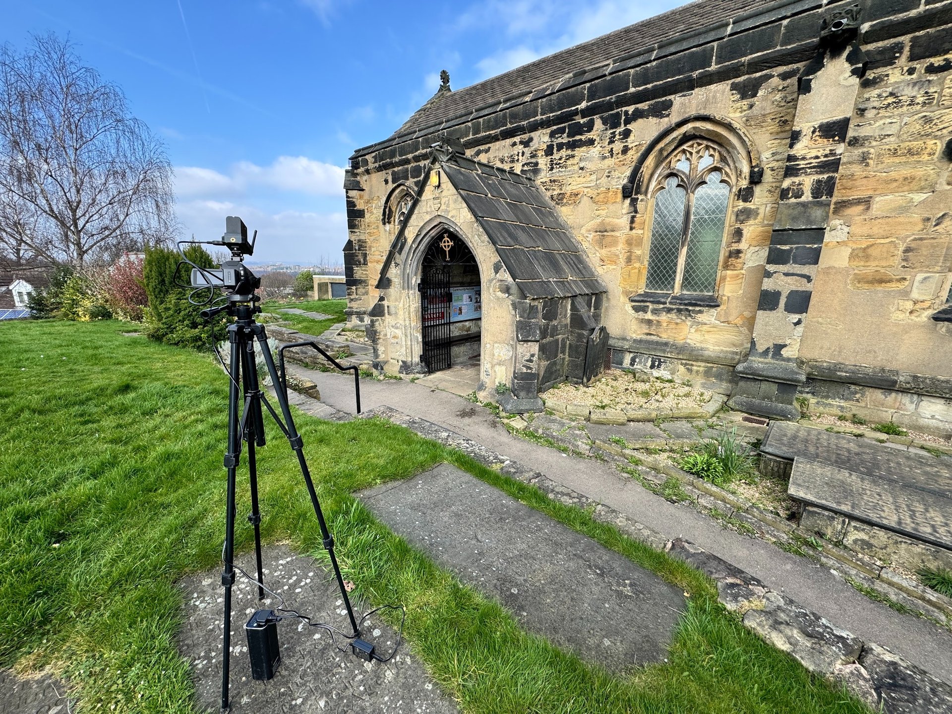 woman wearing yellow long-sleeved dress under white clouds and blue sky during daytime