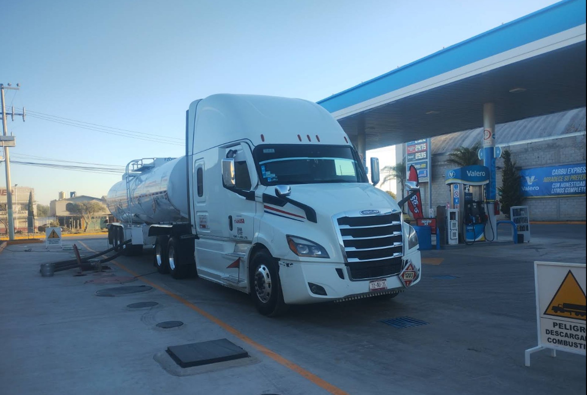 woman wearing yellow long-sleeved dress under white clouds and blue sky during daytime