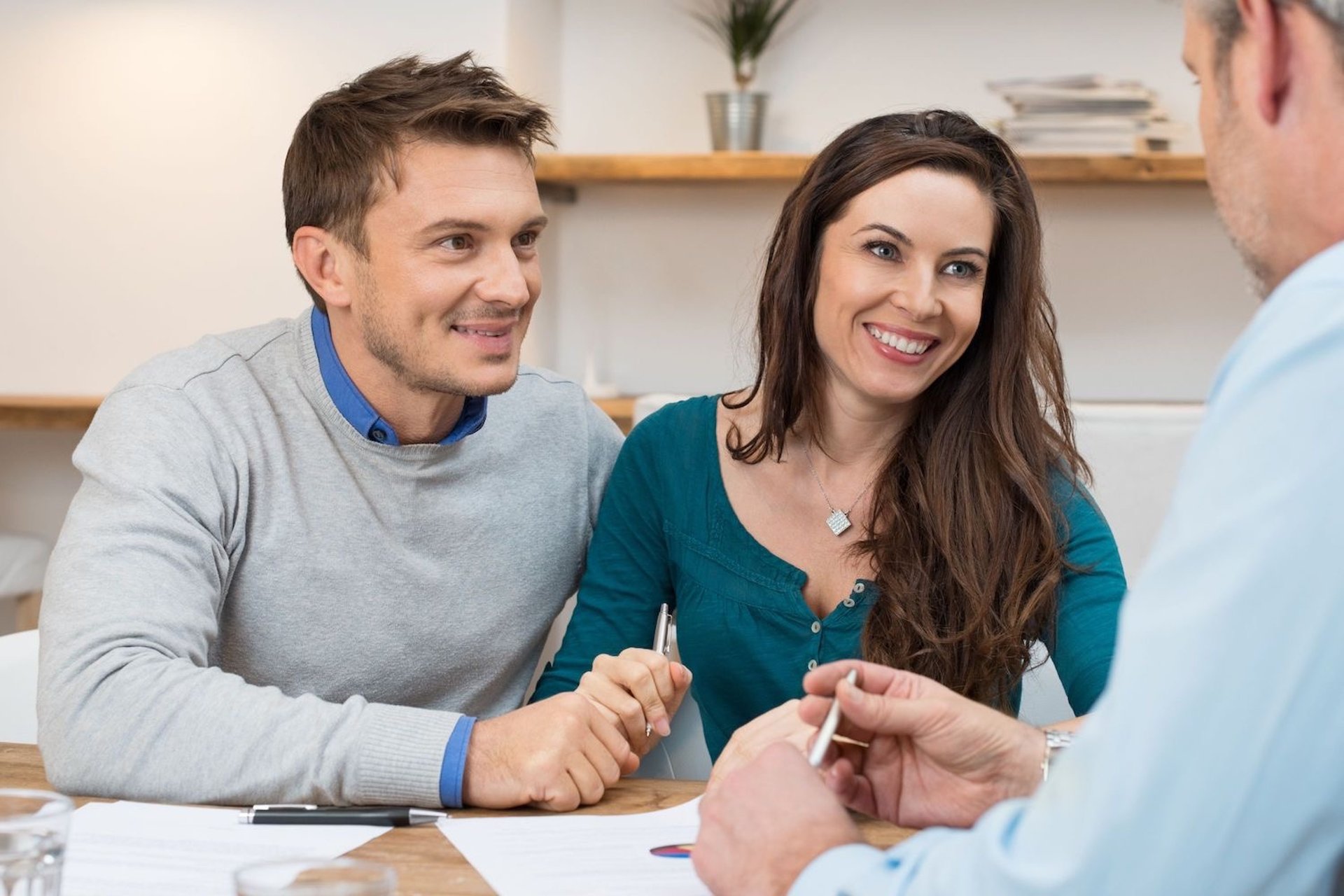 Couple looking at a building proposal
