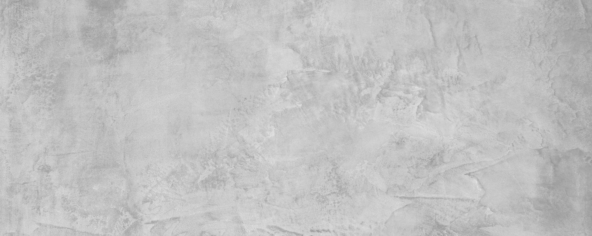 a close up of a white marble wall