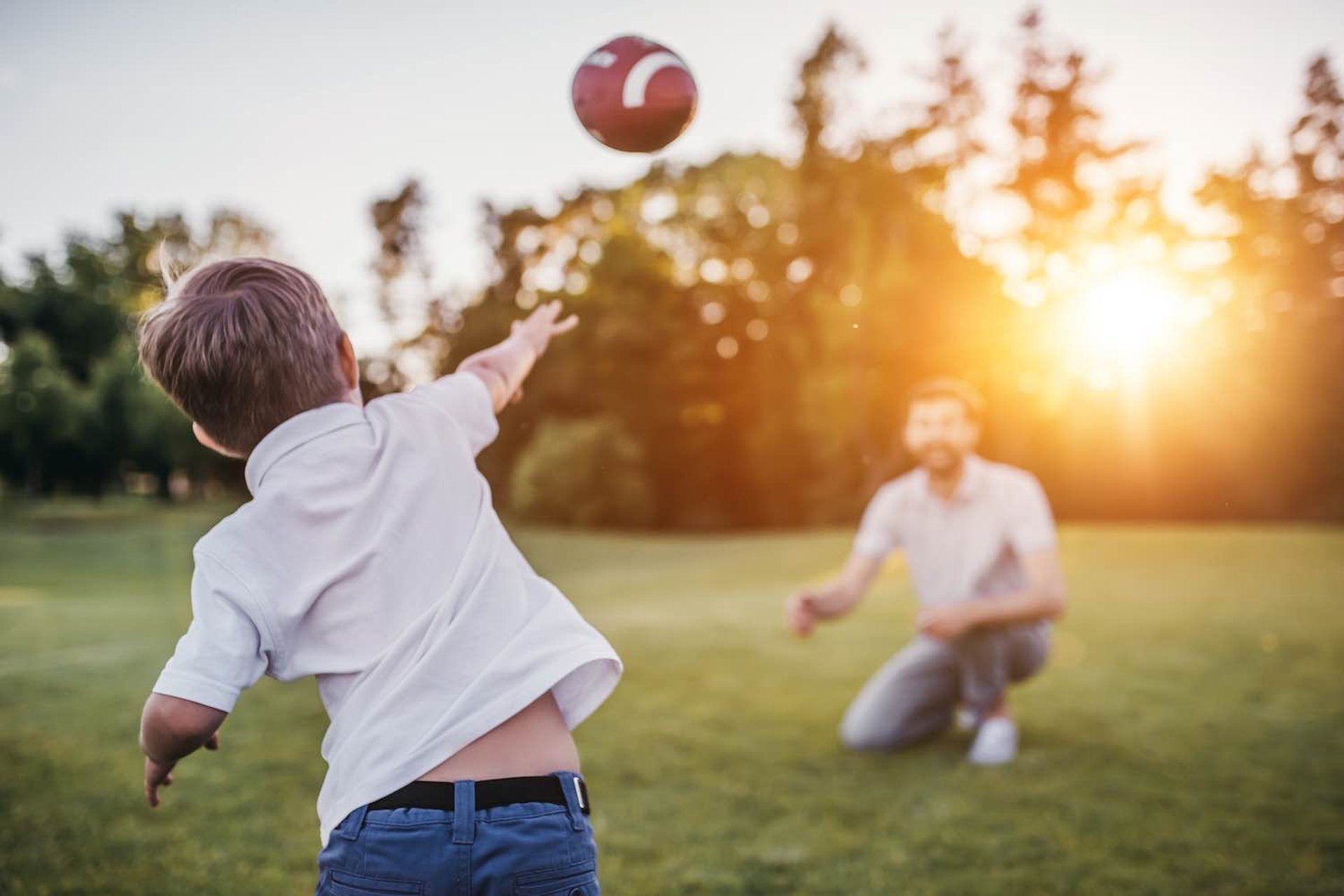 Father and son playing