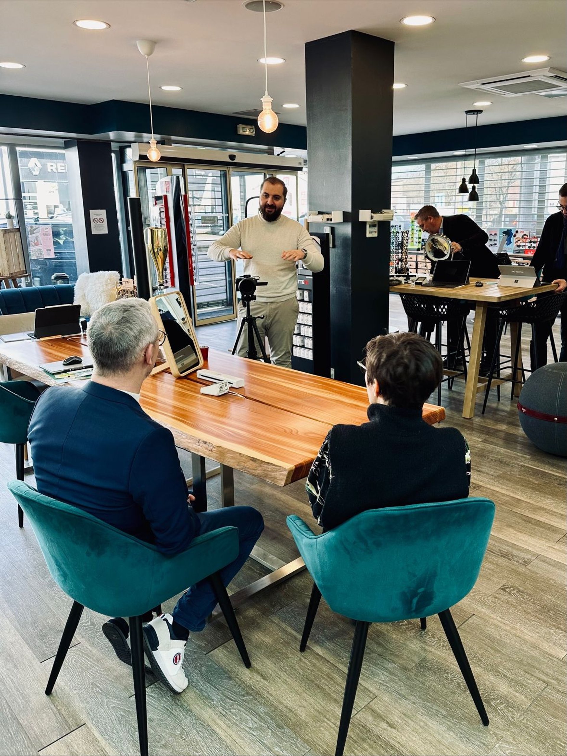 an abstract photo of a curved building with a blue sky in the background
