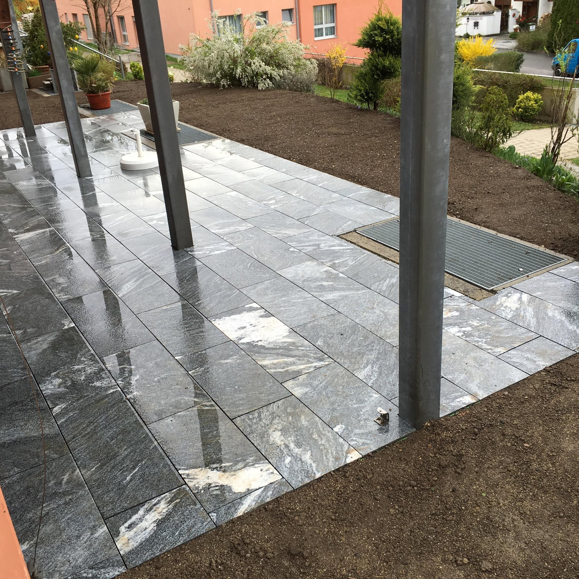 an abstract photo of a curved building with a blue sky in the background