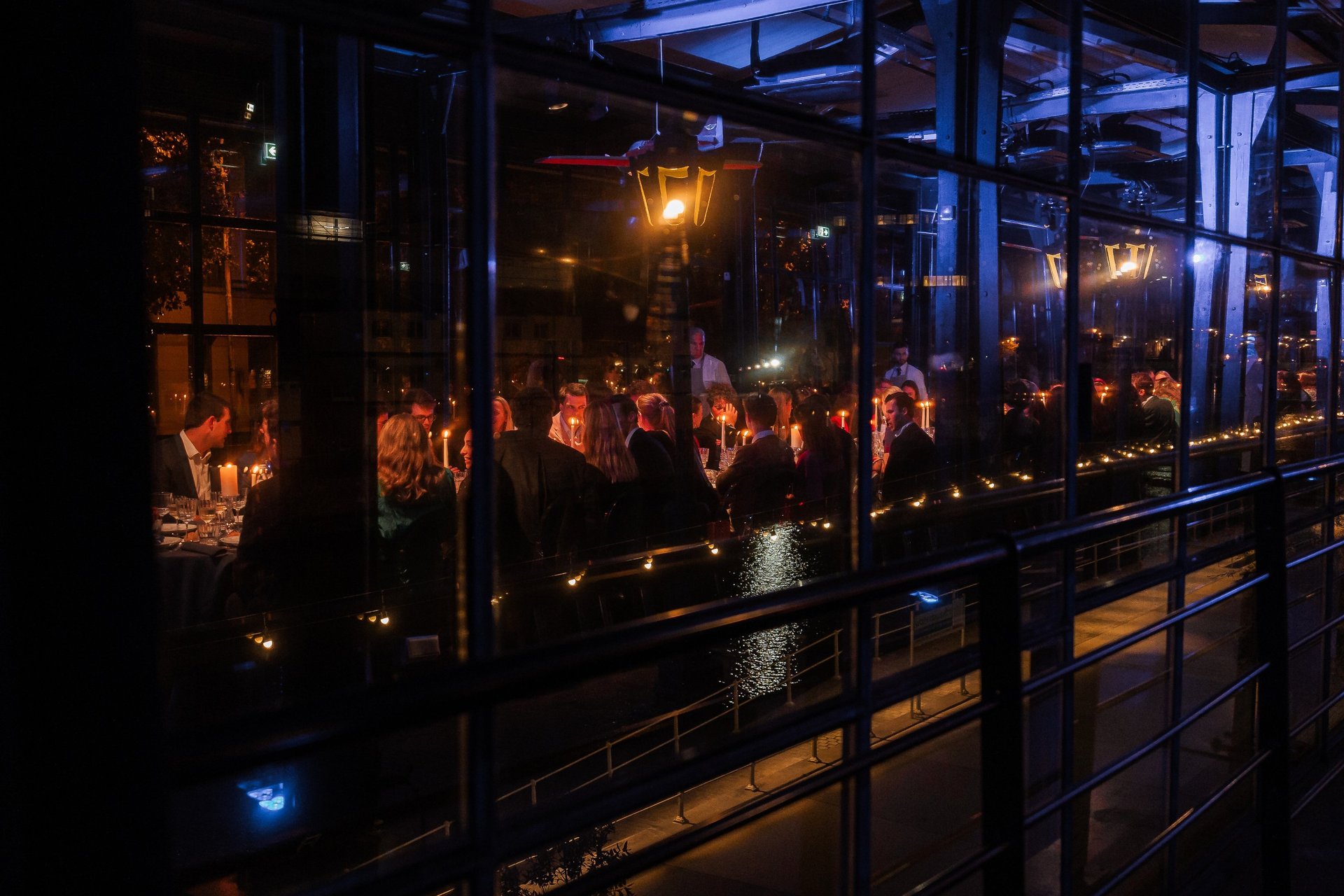 an abstract photo of a curved building with a blue sky in the background
