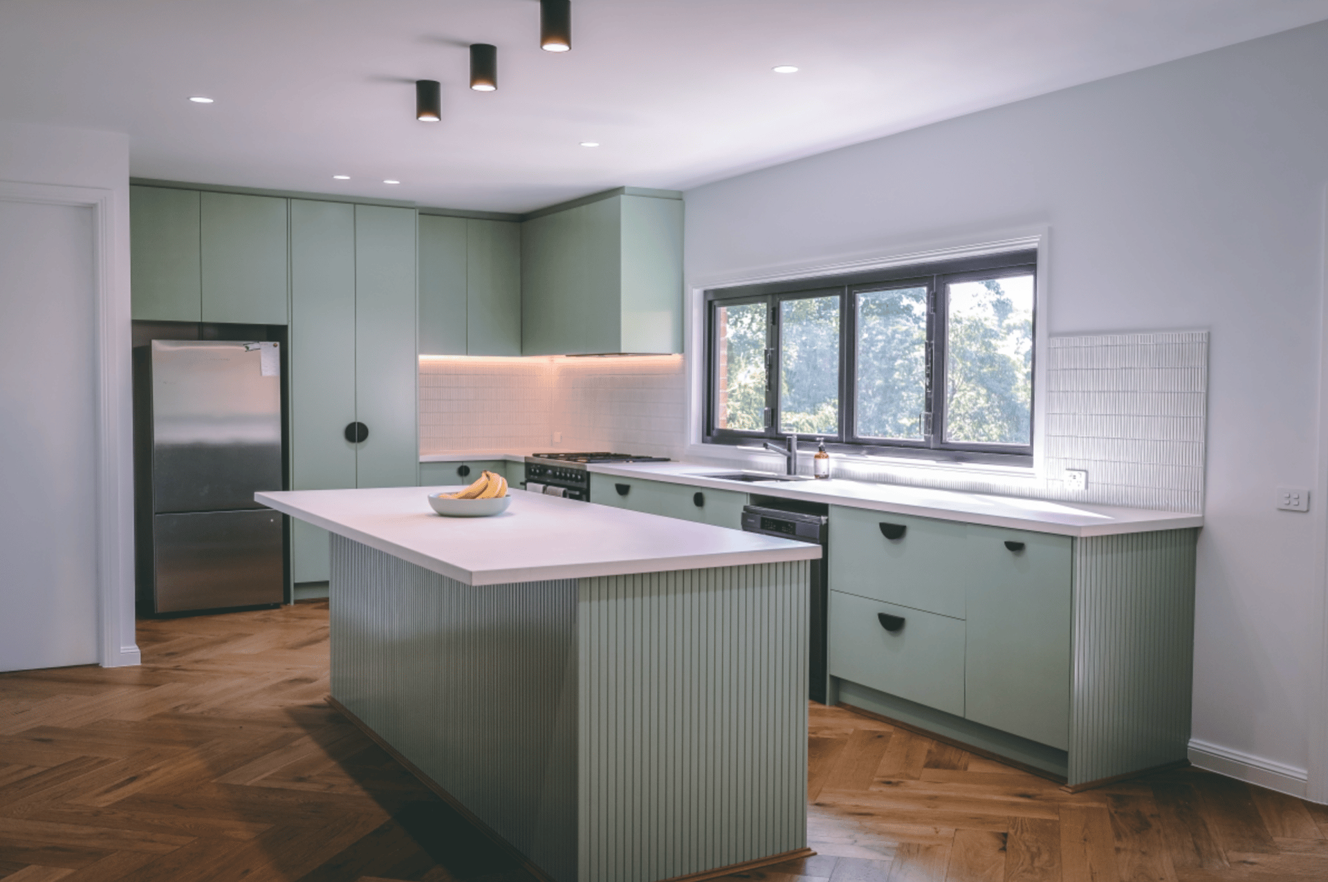 black and brown leather padded tub sofa