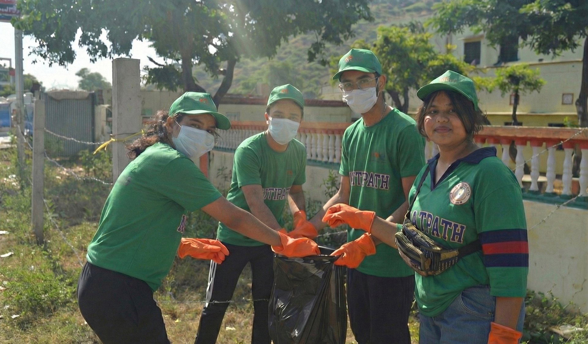 person holding brown and black frog