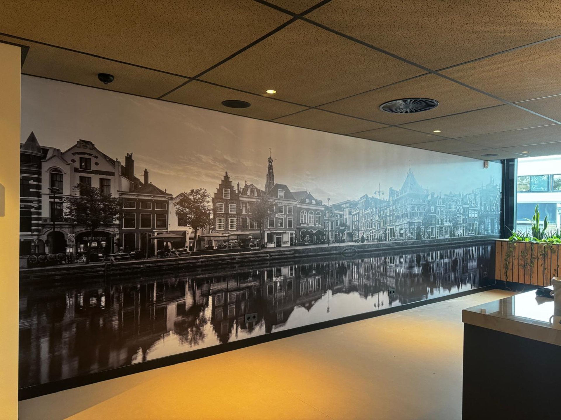 black and brown leather padded tub sofa