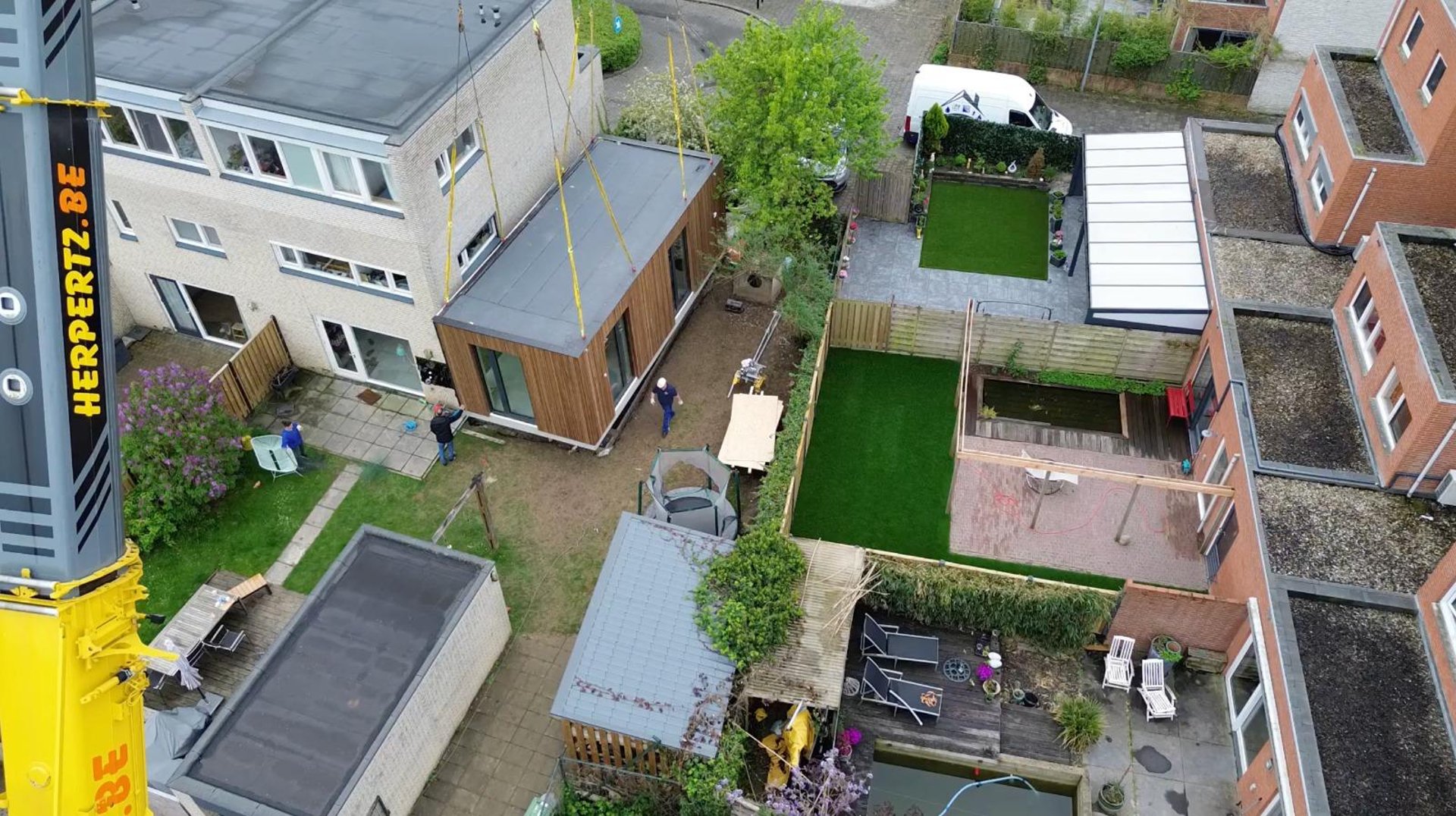 an abstract photo of a curved building with a blue sky in the background