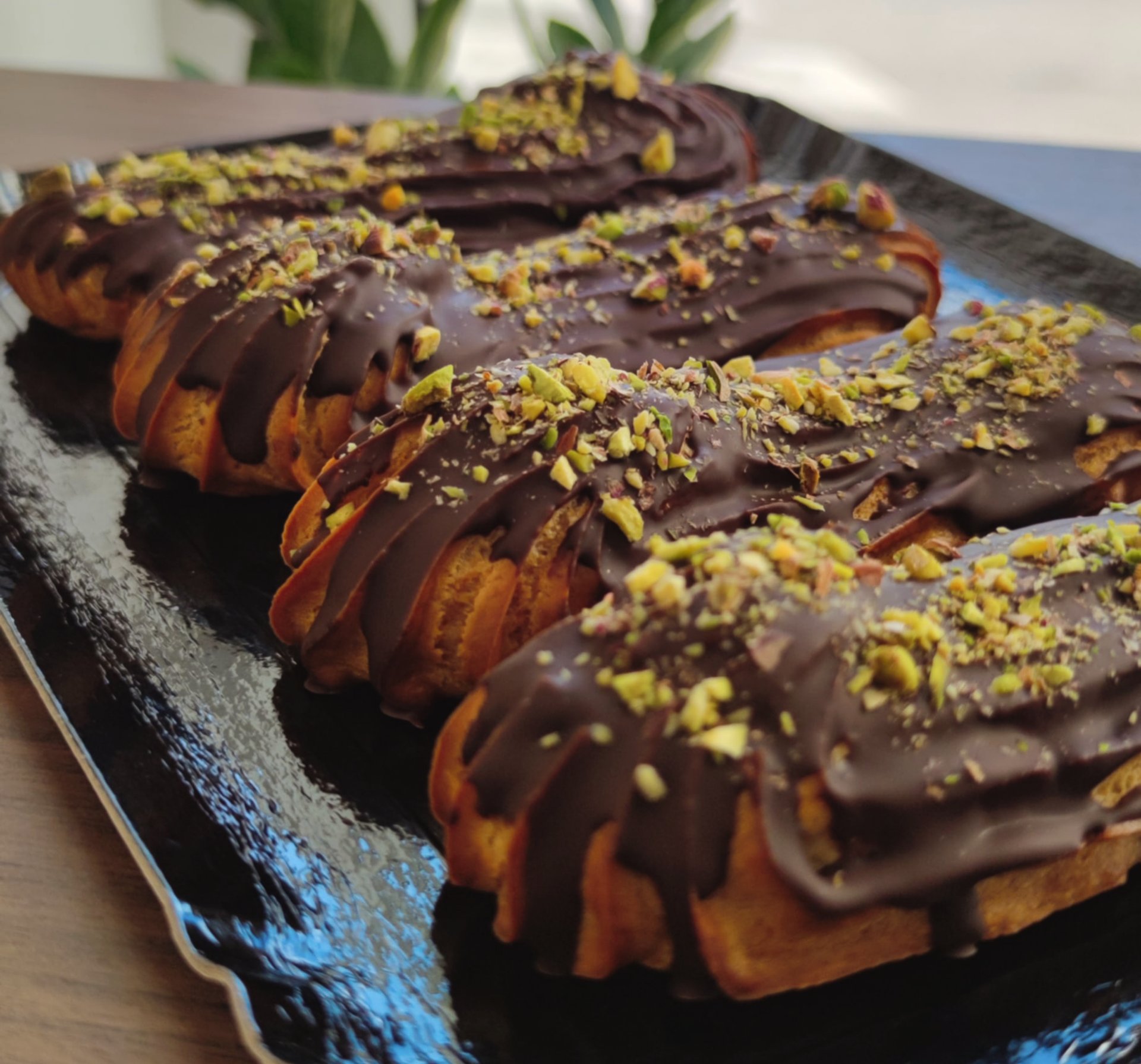 black and brown leather padded tub sofa